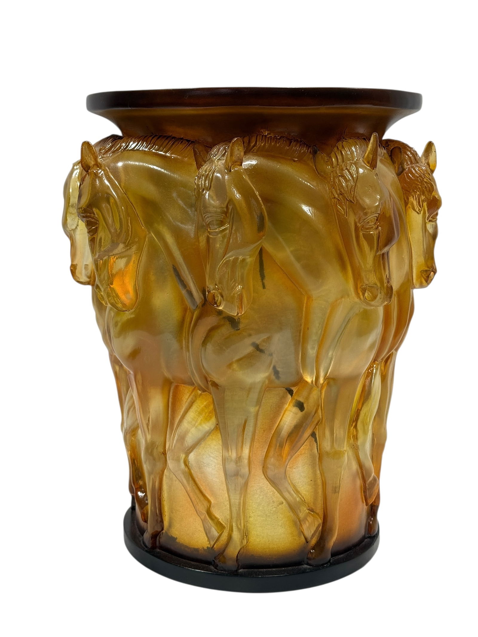 Amber Acrylic Horse Motif Vase w/ Painted Liner: This striking decorative vase features a dramatic wraparound horse motif sculpted in translucent amber-toned acrylic, giving the piece depth, motion, and a bold Art Deco–inspired presence. The exter