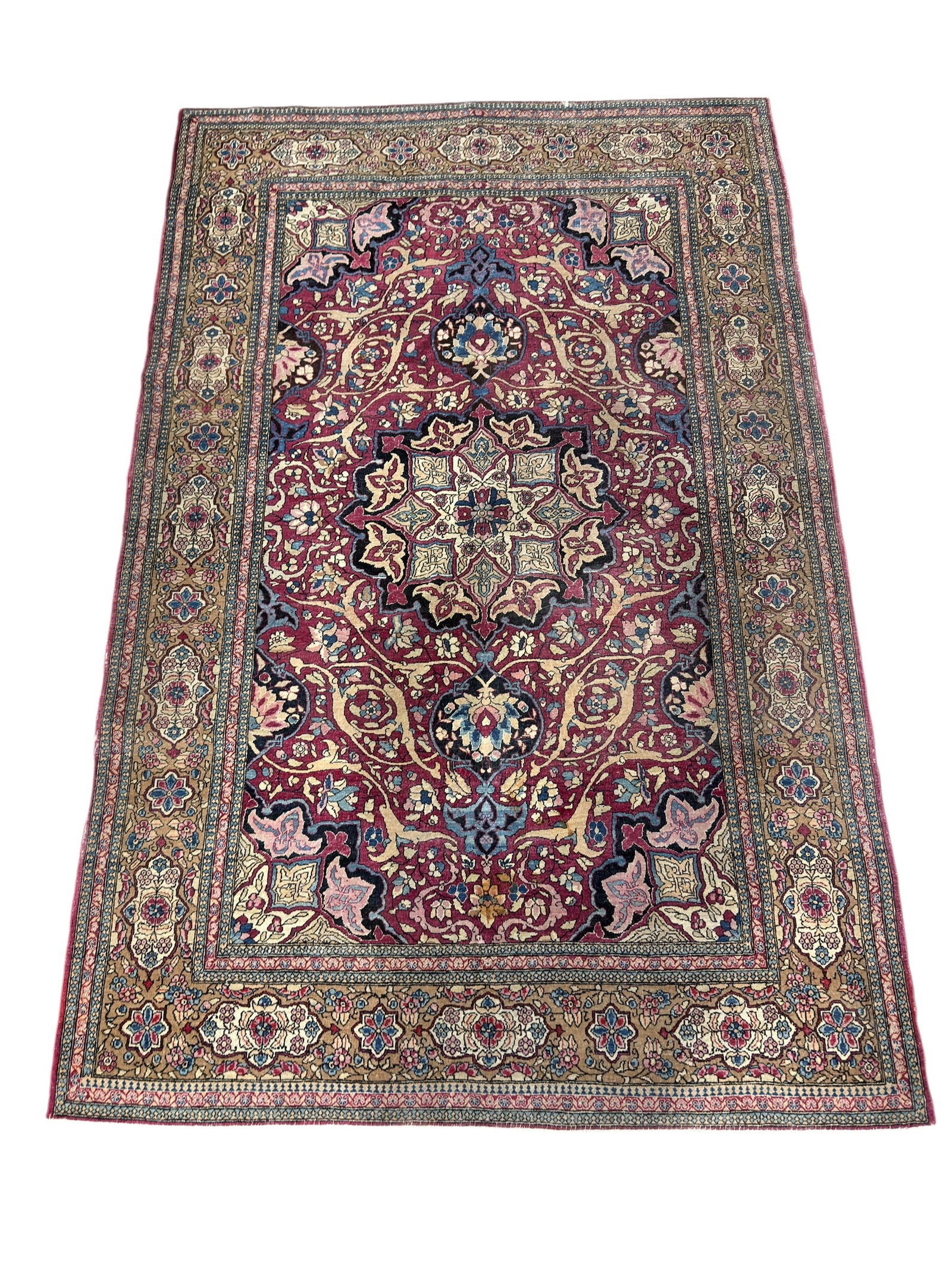 Early 20th C. Persian Sarouk Farahan Hand-Knotted Area Rug: This antique Persian Sarouk Farahan area rug, woven in west-central Iran circa 1910–1930, features a richly saturated raspberry-red field centered by an intricate floral medallion and surrounded by