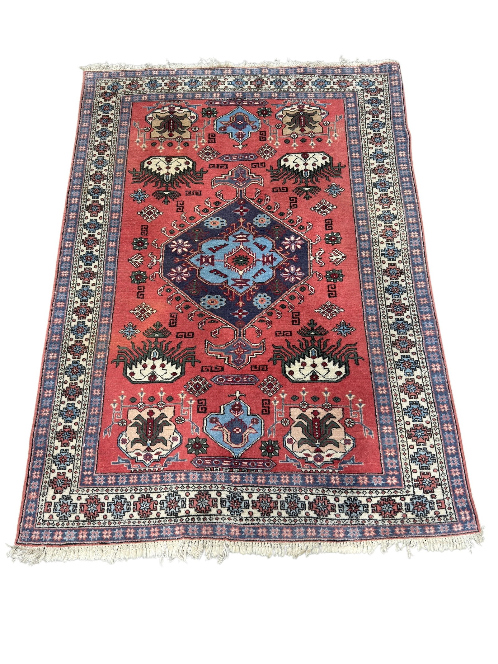 Antique Caucasian Kazak Area Rug: Antique Caucasian Kazak area rug, likely woven in the southern Caucasus region (present-day Azerbaijan or Armenia), circa late 19th to early 20th century, featuring a bold geometric central medallion 
