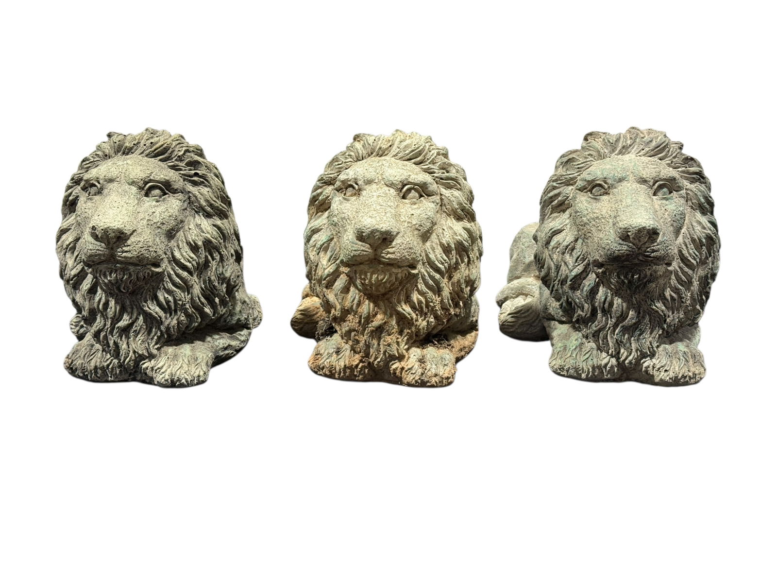 Set of 3 Cast Concrete Lion Planter Stands: This set of three cast concrete lion planter stands features reclining lions with detailed manes and expressive faces, designed to support small planters, urns, or decorative garden elements on their