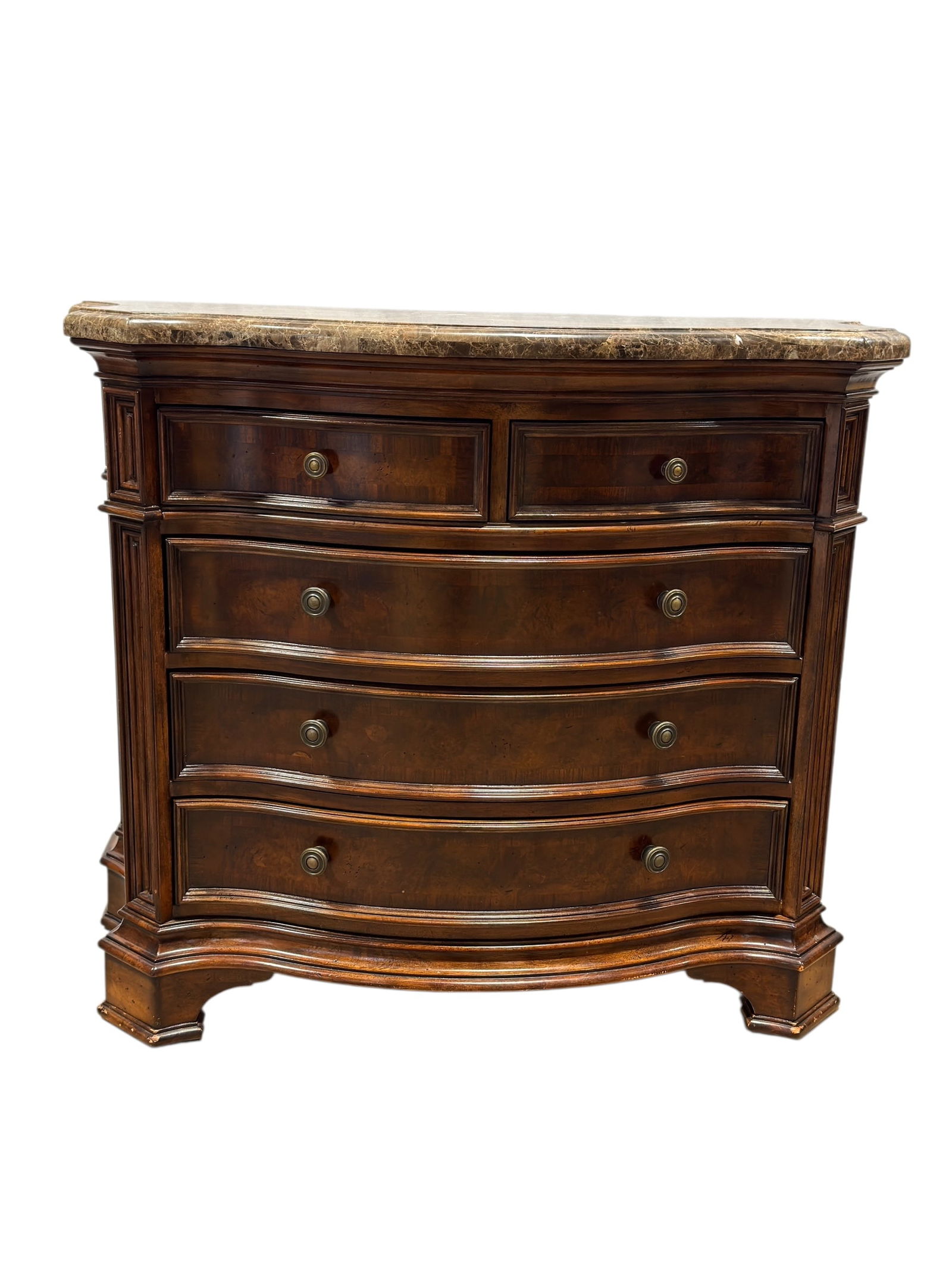 Bow-Front Marble-Top Chest of Drawers: This elegant bow-front chest of drawers features a richly finished wood case with a serpentine front, five graduated drawers fitted with round metal pulls, and a shaped, polished marble top in warm br