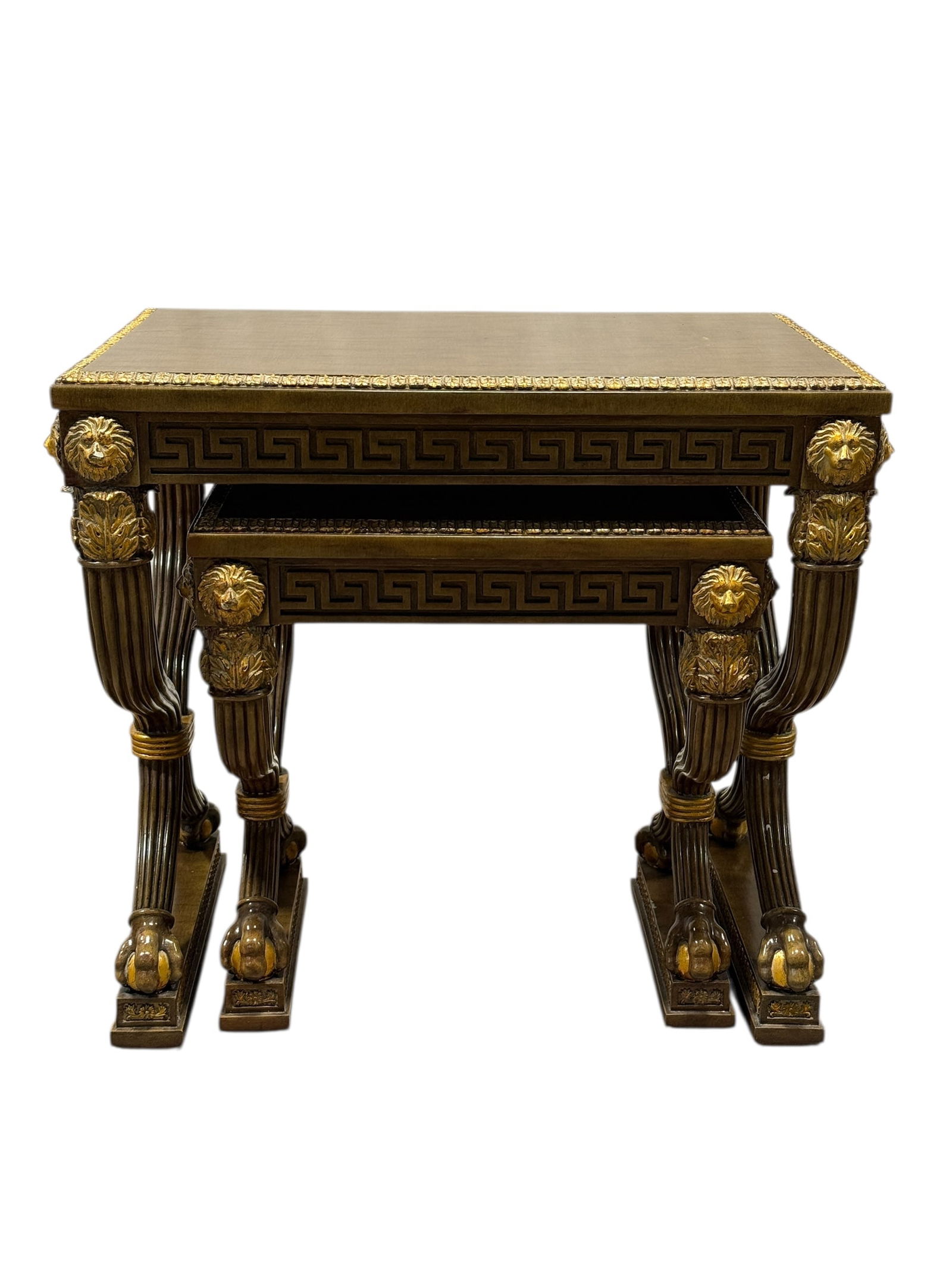 Neoclassical Empire Style Gilt-Mounted Nesting Tables: This handsome set of neoclassical Empire-style nesting tables consists of two graduated rectangular tables designed to nest neatly together, each featuring a warm gilt-toned top framed by an ornate mo