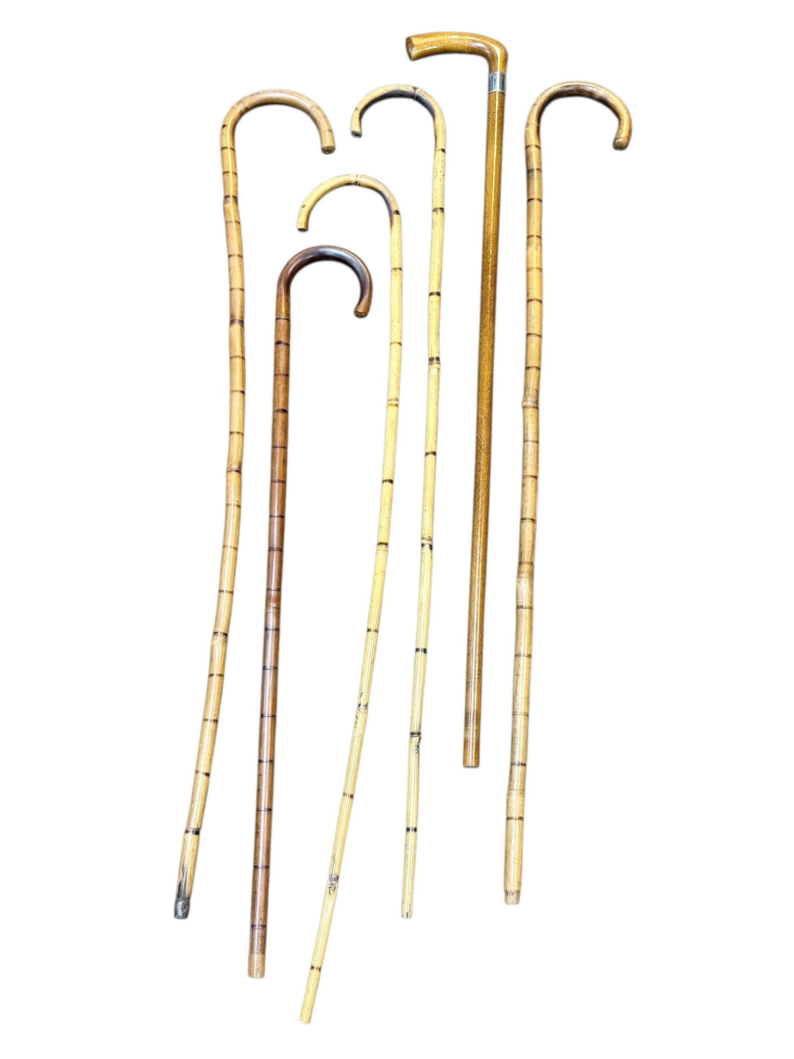 Group of 6 Antique Bamboo & Wooden Walking Sticks: Group of 6 Antique Bamboo & Wooden Walking Sticks. 5 Bamboo & 1 Wooden. All in used condition.