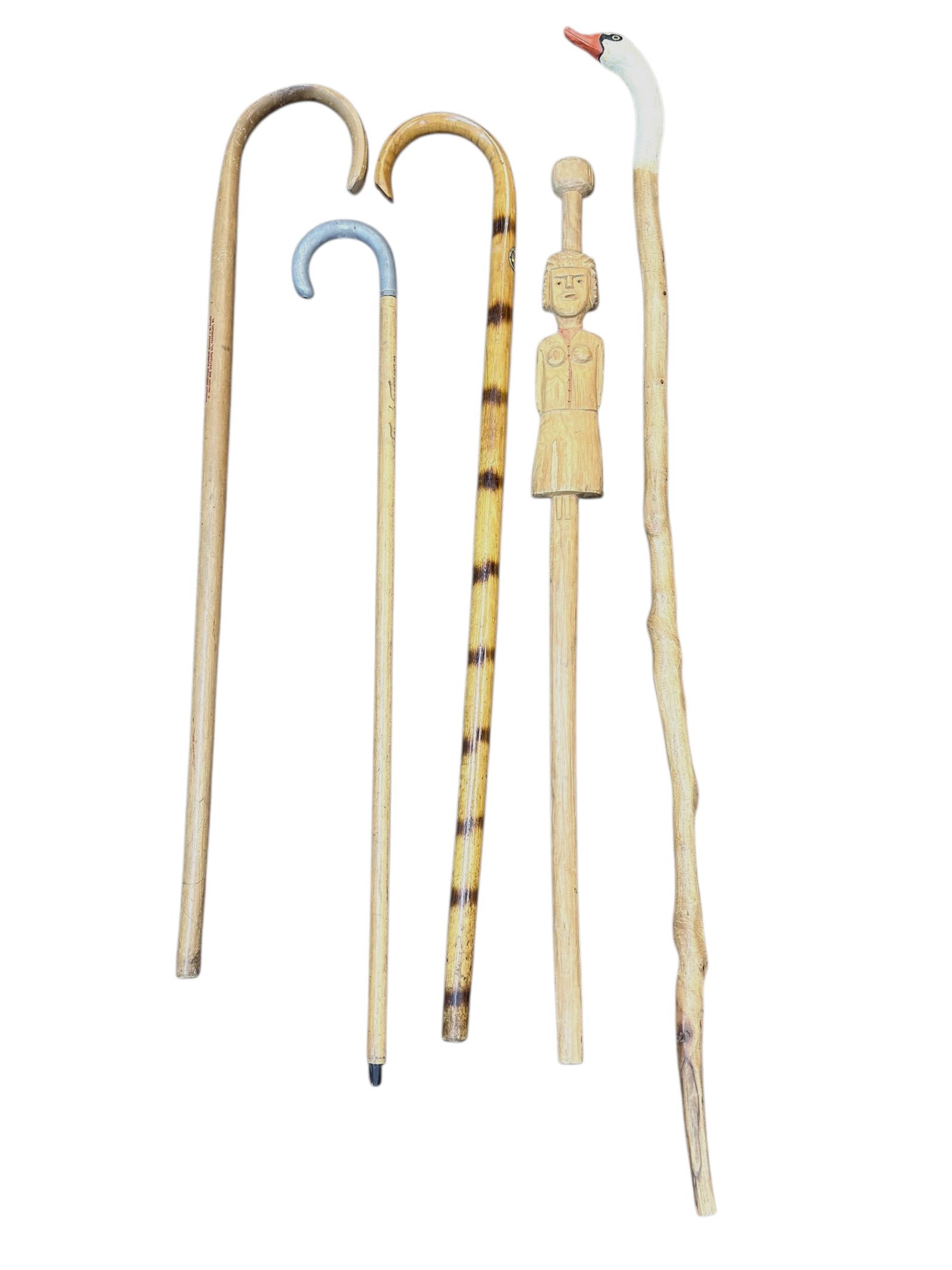 Group of 5 Wooden Walking Sticks: Group of 5 Wooden Walking Sticks. 2 folk art walking sticks. In used condition.