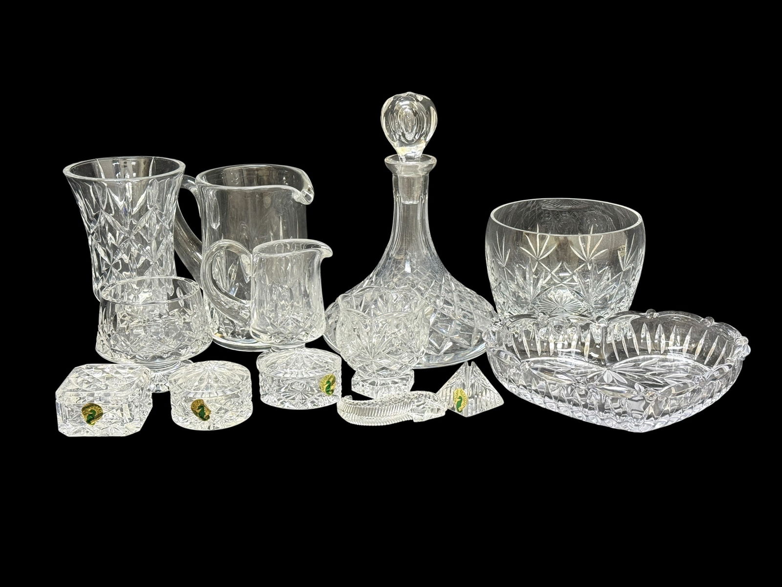 Group of 13 Crystal Glass Pieces: Attractive mixed group of 13 crystal pieces featuring 6 Waterford examples identifiable by their green seahorse marks, 1 Lenox crystal bowl, and 6 additional unmarked crystal pieces, all displaying cl