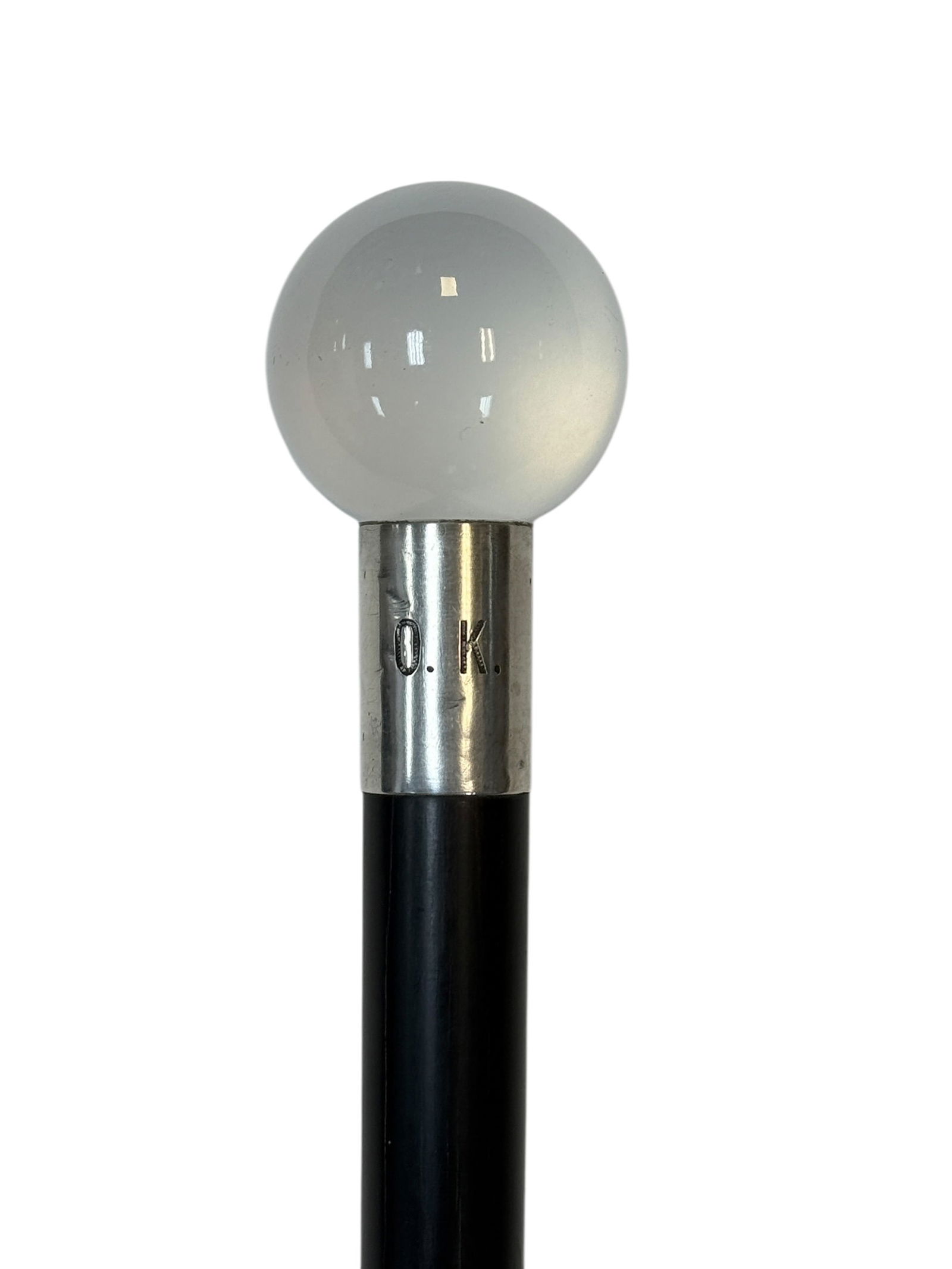 Early 20th C. Sterling Mounted Moonstone Art Deco Dress Cane: Elegant early 20th century Art Deco dress cane featuring a luminous spherical moonstone pommel mounted in a sterling silver collar engraved “O.K.” and bearing additional hallmarks along wi