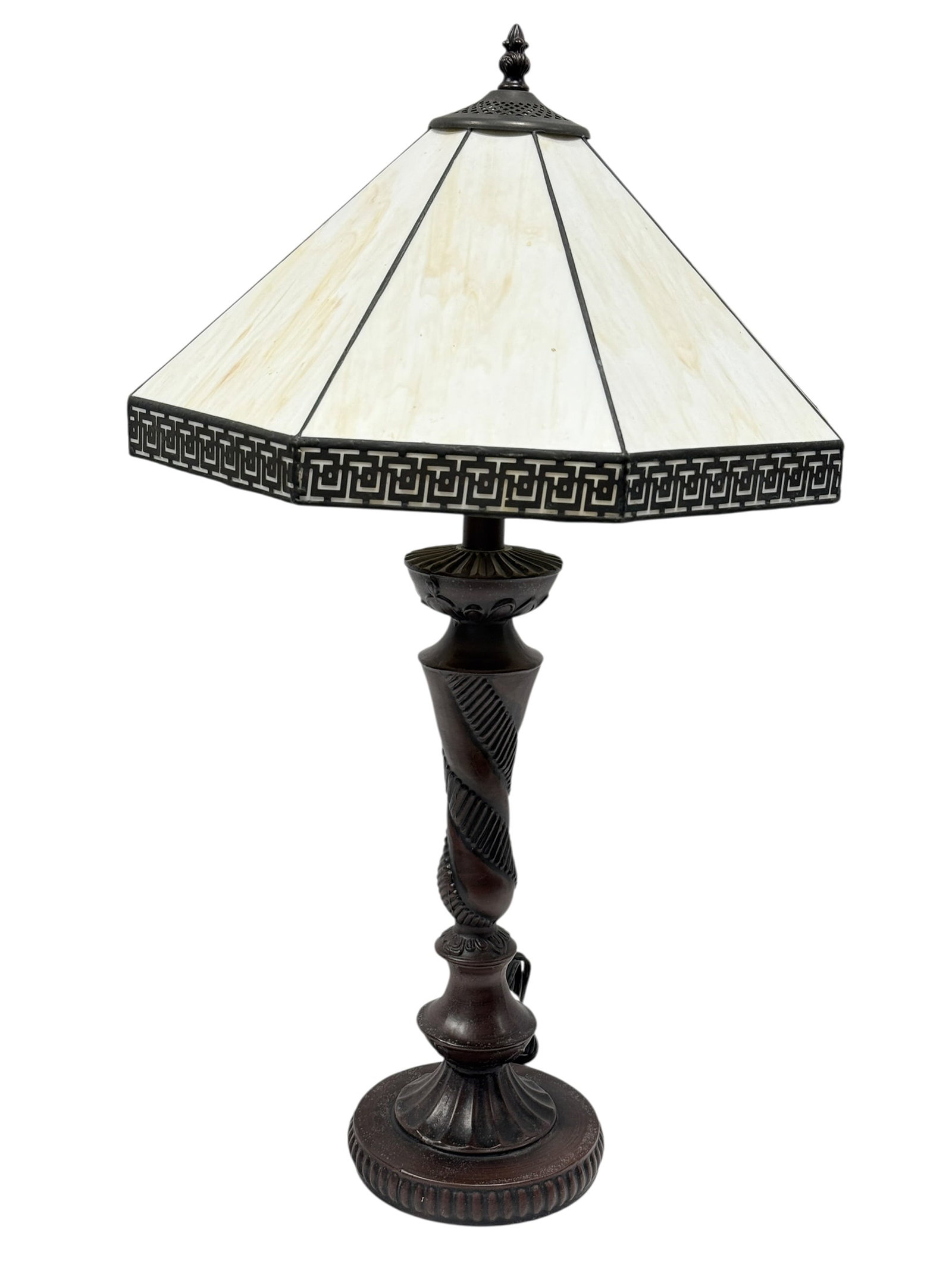 Tiffany Style Slag Glass Table Lamp with Greek Key Border: This Tiffany style table lamp features an eight-panel slag glass shade in warm cream and subtle honey tones, accented along the lower edge with a bold black Greek key border, and is mounted on a dark