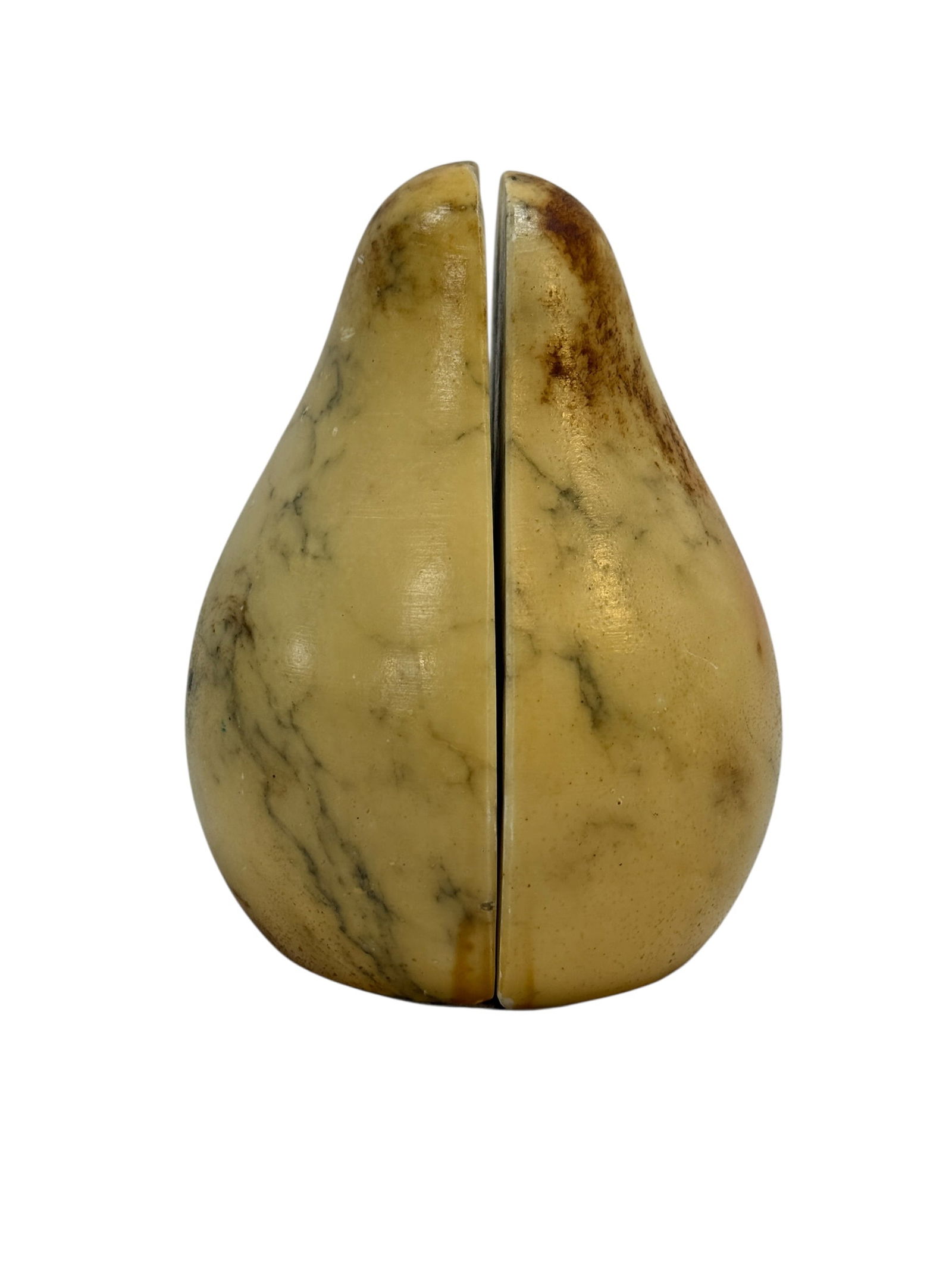 Mid-20th C. Italian Marble Pear Form Bookends, Pair: Charming mid-20th century pair of carved marble bookends in the stylized form of halved pears, likely Italian, each sculpted from variegated cream and honey-toned marble with natural gray veining and