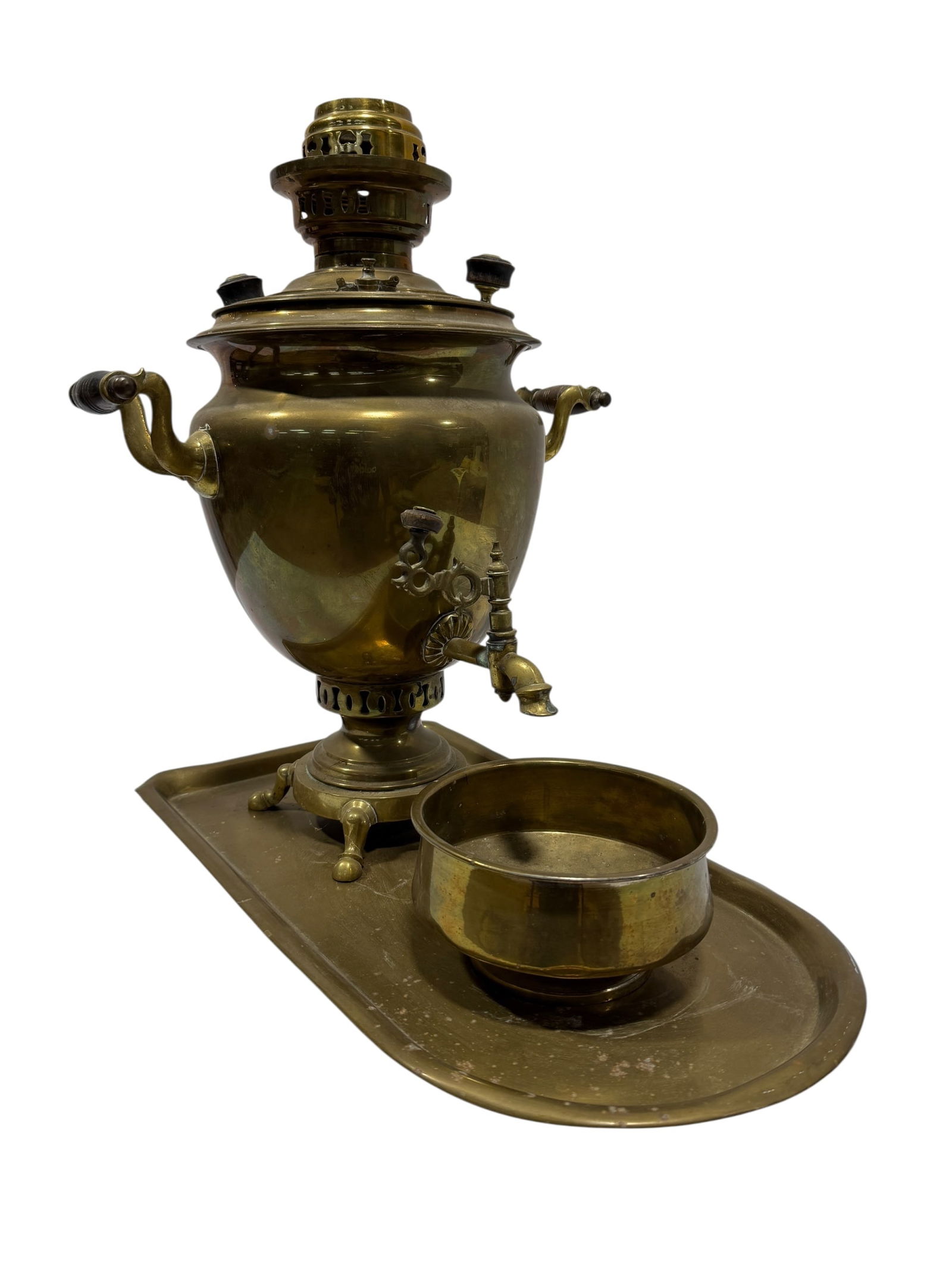 19th C. Russian Brass Samovar with Tray & Drip Bowl: 19th century Russian brass samovar of traditional urn form, featuring a rounded body with twin scrolled side handles fitted with turned dark wood grips, a decorative pierced chimney collar and burner
