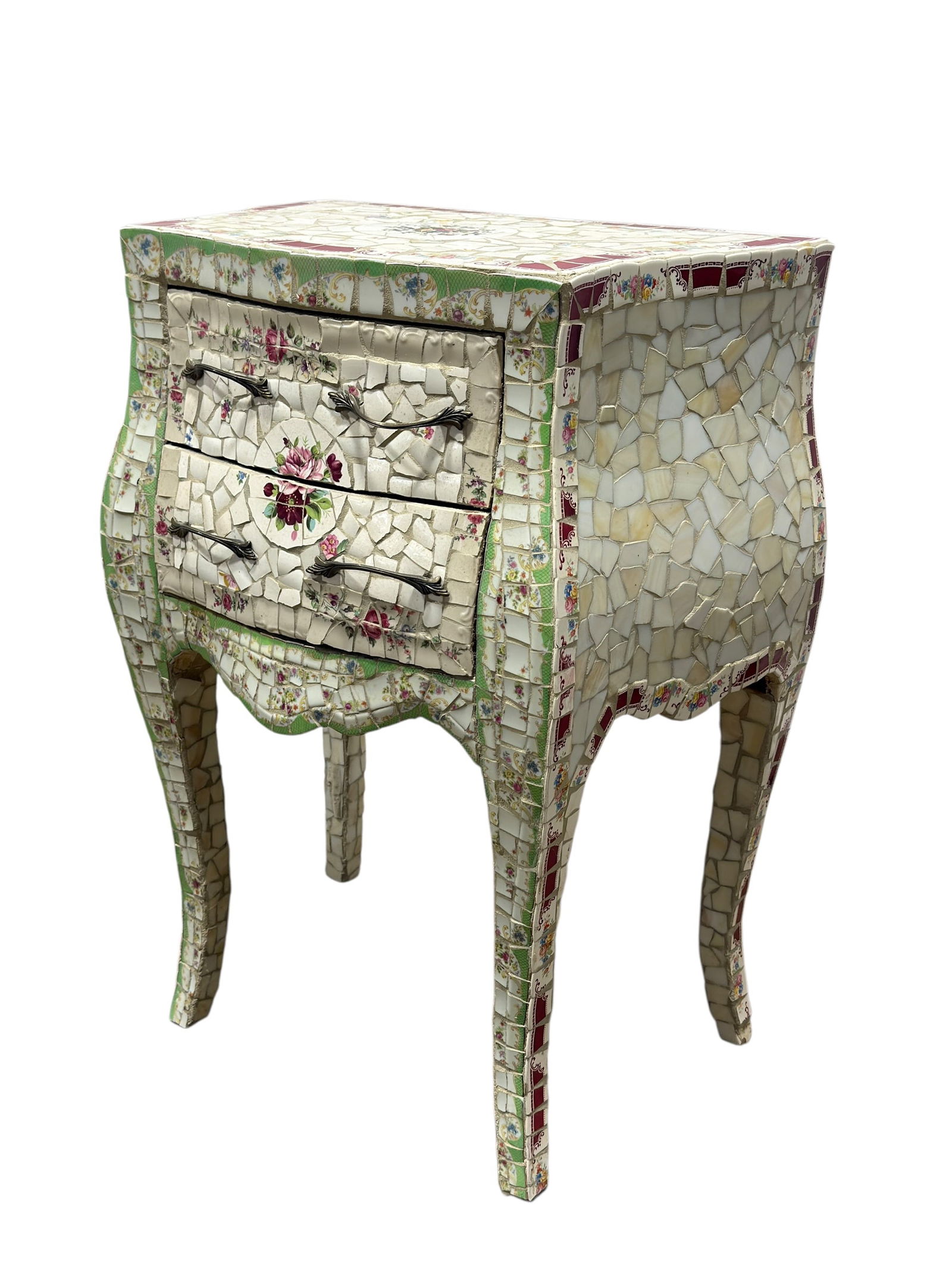 Vintage Mosaic Porcelain Tile 2 Drawer Bombe Form Chest: 20th century decorative two-drawer chest in bombe form, the entire exterior encrusted in hand-applied mosaic porcelain and ceramic tile fragments featuring floral transfer patterns in pink, blue, and