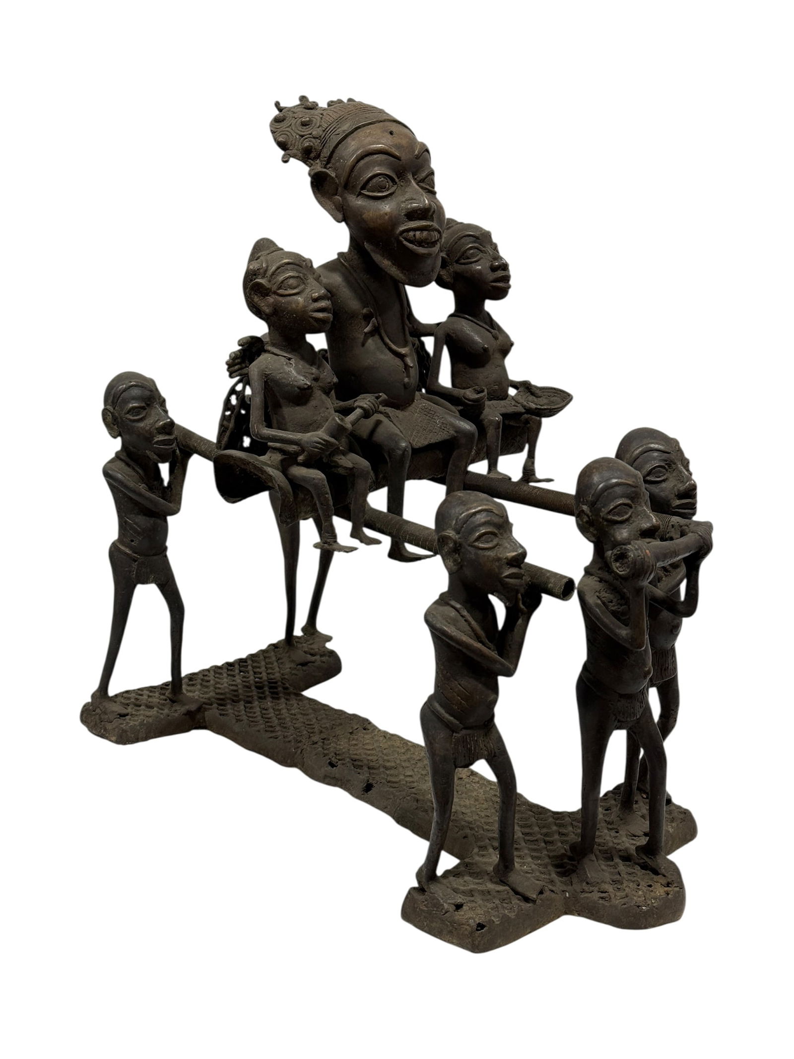 African-Style Figural Bronze Sculpture of Royal Procession: Striking 20th century African-style bronze sculpture depicting a seated crowned figure, possibly a king or dignitary, carried in procession by six attendants holding long poles, the central figure