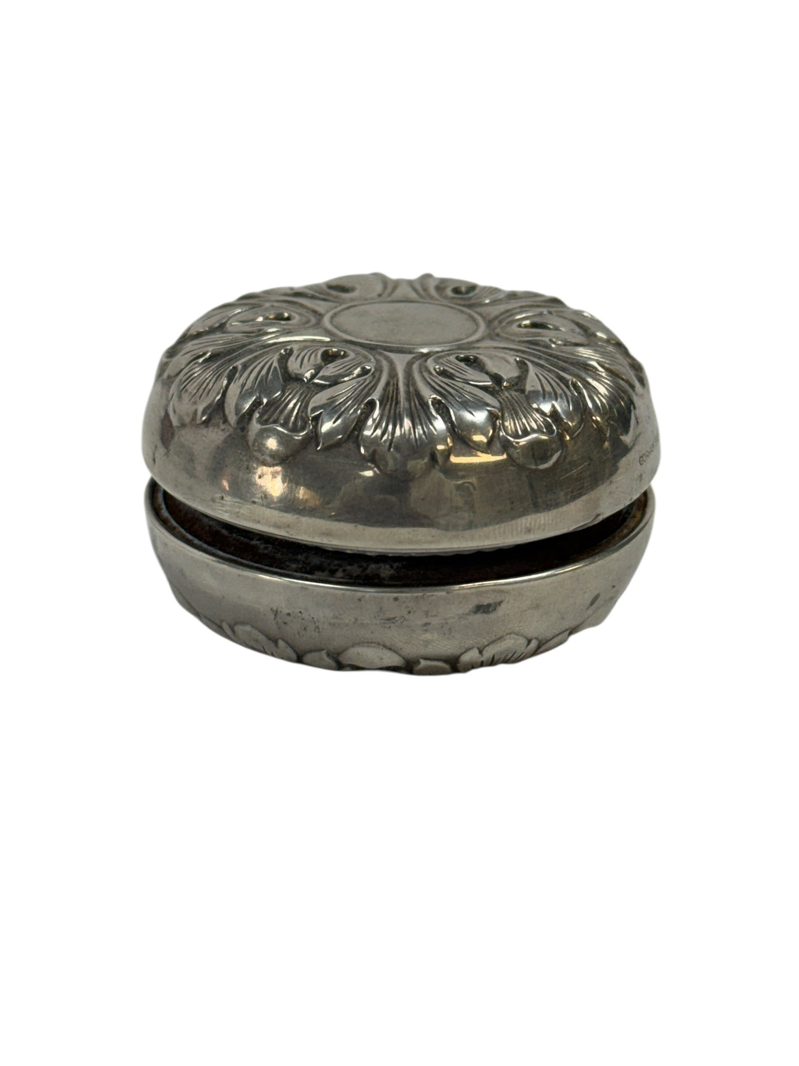 Early 20th C. Art Deco Gorham Sterling Mounted Repoussé Yo-Yo: Early 20th century Gorham sterling silver mounted yo-yo, an unusual and decorative novelty piece featuring a steel body fitted with finely crafted sterling silver covers, each side richly ornamented i