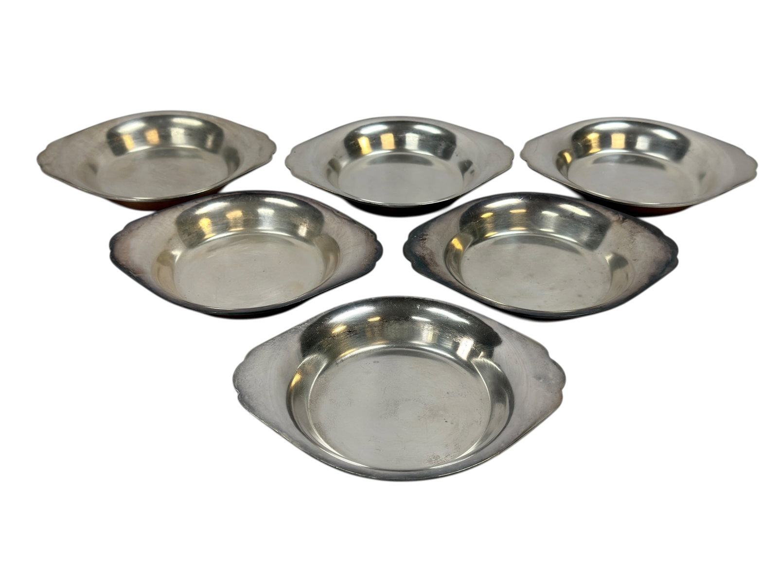 (6) Antique Joseph Heinrichs New York Sterling Silver on Copper Dishes: Set of six rare antique small dishes by Joseph Heinrichs of New York, each finely crafted in heavy gauge copper with a sterling silver wash interior, the undersides clearly stamped “JOS. HEINRICHS N