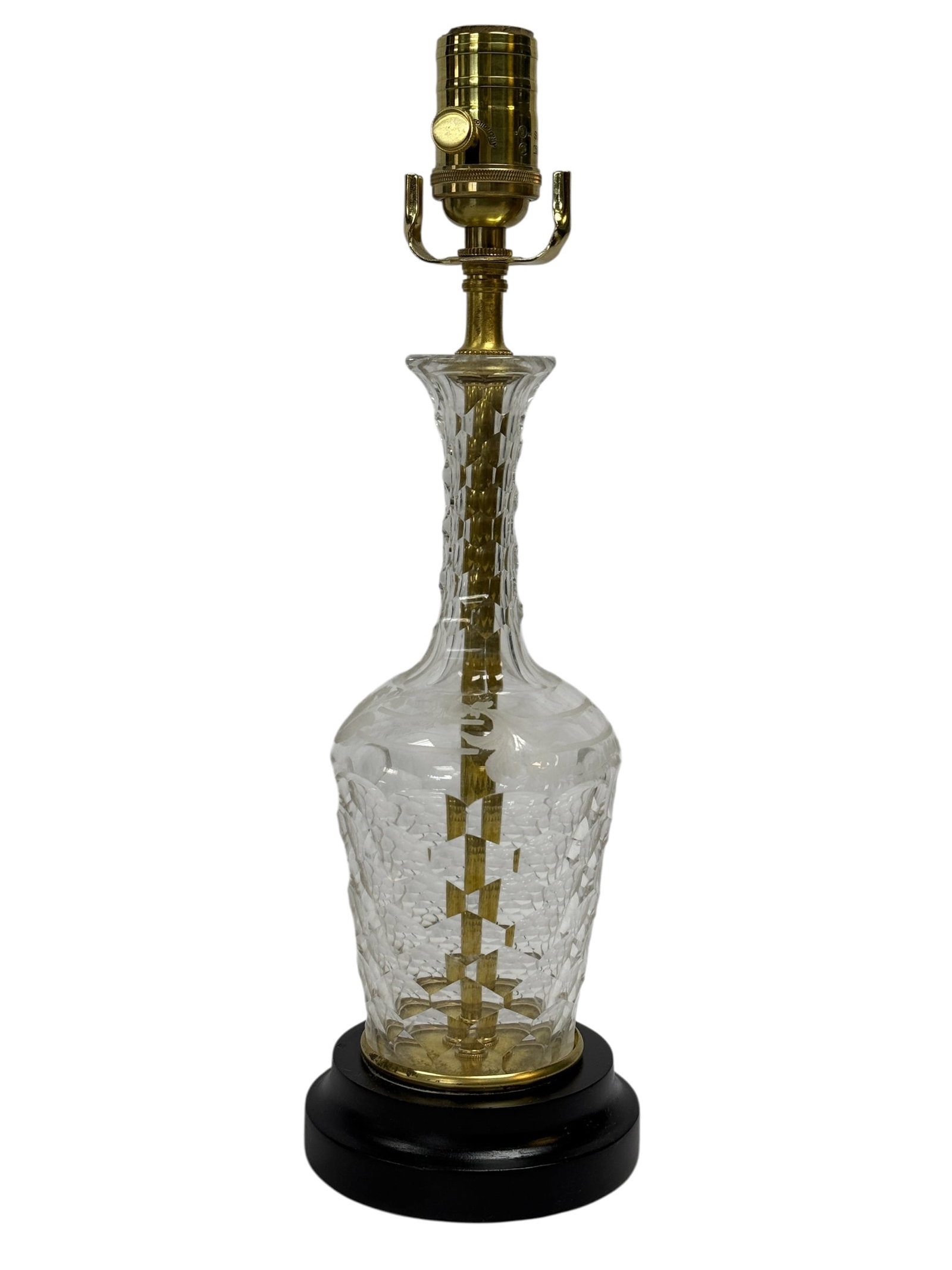 Early 20th C. Cut & Etched Glass Decanter Lamp: This elegant early 20th century cut and etched glass decanter has been thoughtfully converted into a table lamp, featuring a beautifully faceted body with fine etched decoration throughout and a warm