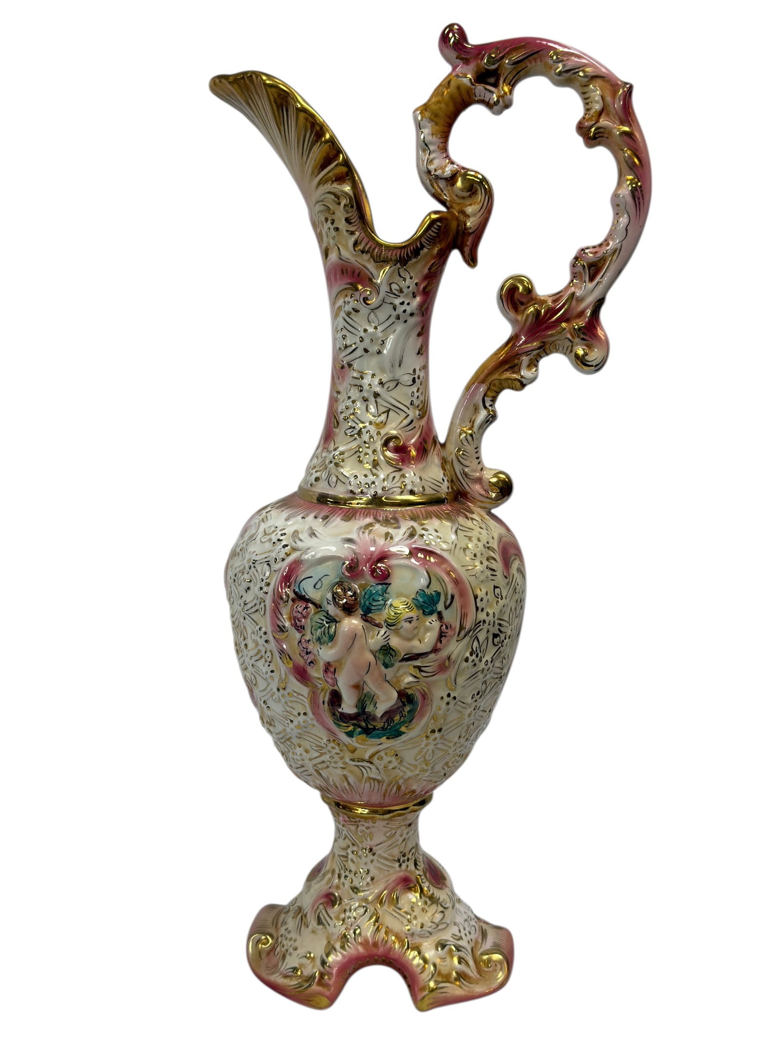 Italian Capodimonte Figural Porcelain Ewer Vase: A highly decorative Italian Capodimonte porcelain ewer vase, likely mid-20th century, featuring an ornate Rococo-inspired form with a tall, flaring spout and an elaborate scrolling handle richly accen