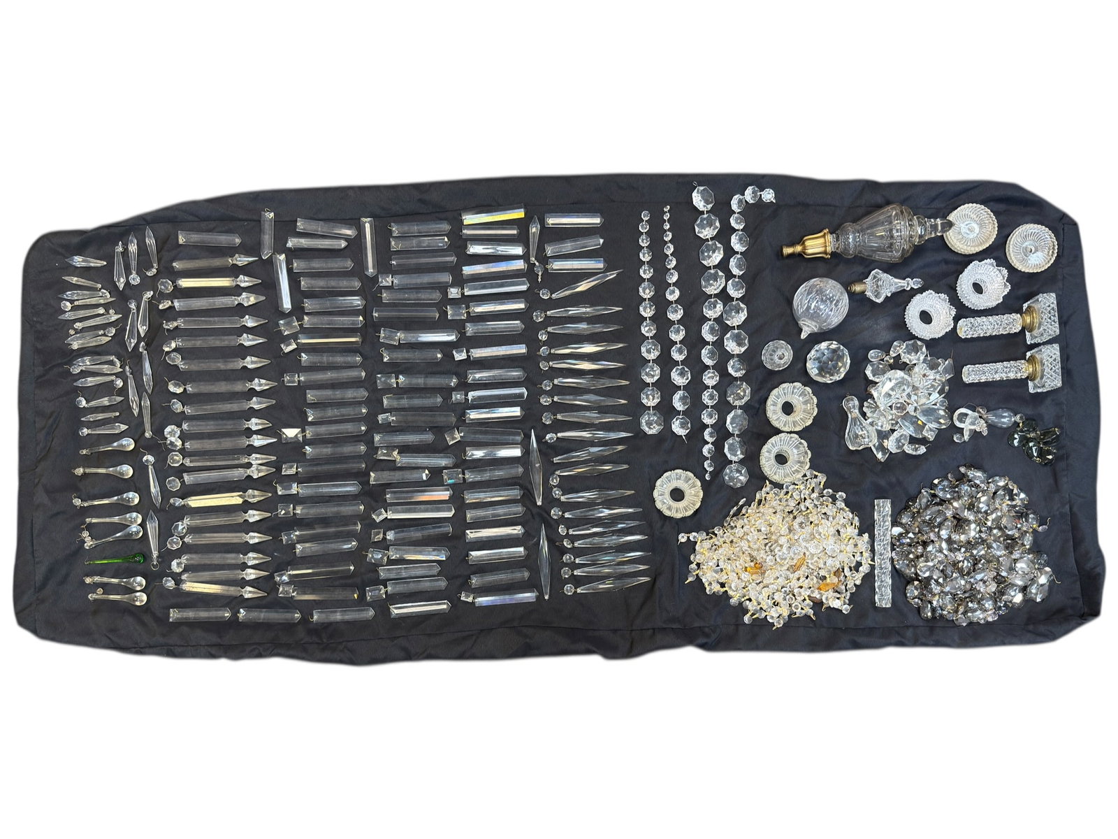 Large Antique & Vintage Crystal Prism & Lamp Parts Lot: A substantial and visually impressive mixed lot of antique and vintage crystal prisms, chandelier drops, and lamp components, comprising a wide assortment of cut glass elements including numerous spea