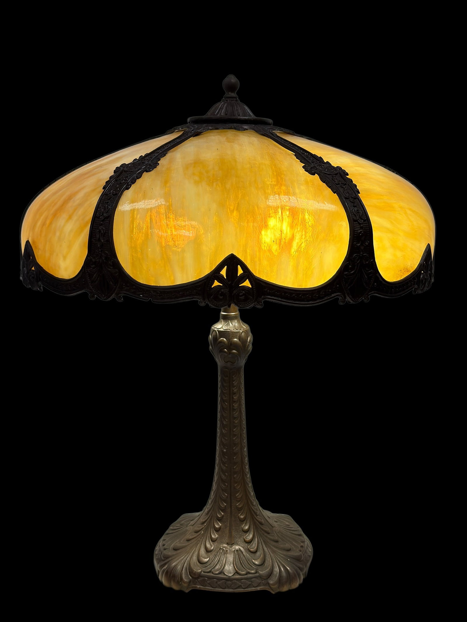 Early 20th C. Art Nouveau Slag Glass Panel Table Lamp Attr. to Edward Miller & Co.: A fine early 20th century Art Nouveau table lamp attributed to Edward Miller & Co., featuring a richly variegated caramel slag glass domed shade composed of softly swirling amber, honey, and cream ton