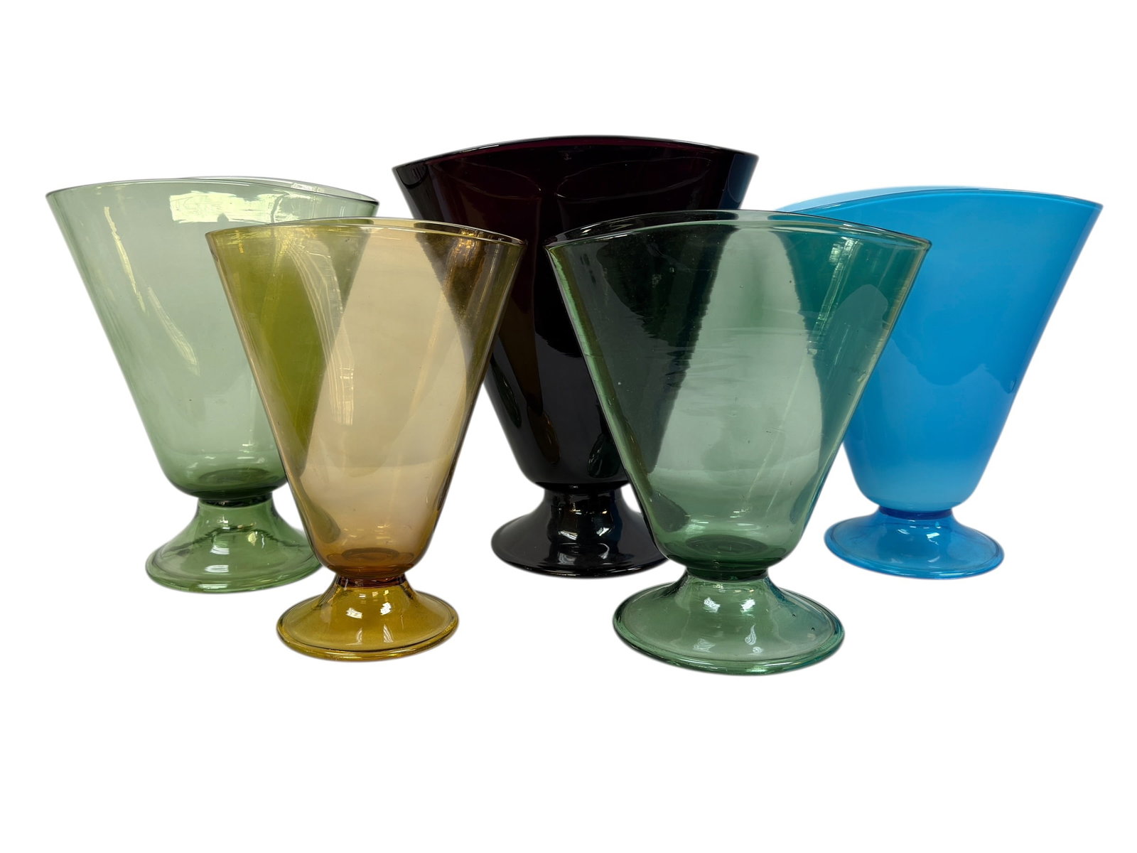 Collection of 5 Mid Century Hand Blown Art Glass Fan Vases: A vibrant and decorative collection of five mid century modern hand blown art glass fan-form vases, each featuring a classic flared conical body with gently pinched or freeform rims and raised on inte