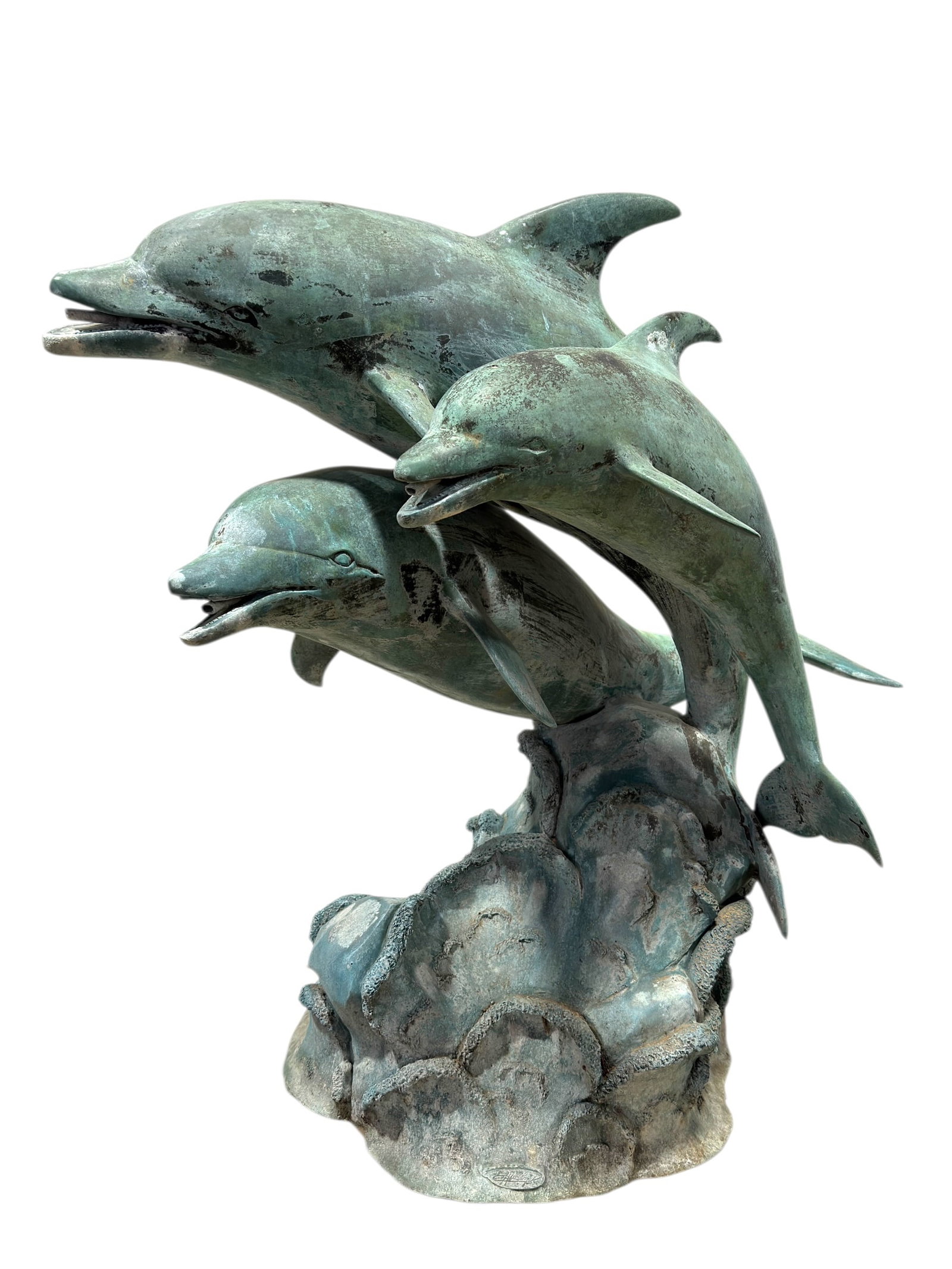 Large Signed Patinated Bronze "Dolphin Trio" Garden Fountain Sculpture: A striking and substantial bronze garden fountain sculpture depicting a dynamic trio of dolphins leaping in intertwined formation above a naturalistic rocky base, the composition capturing a sense of