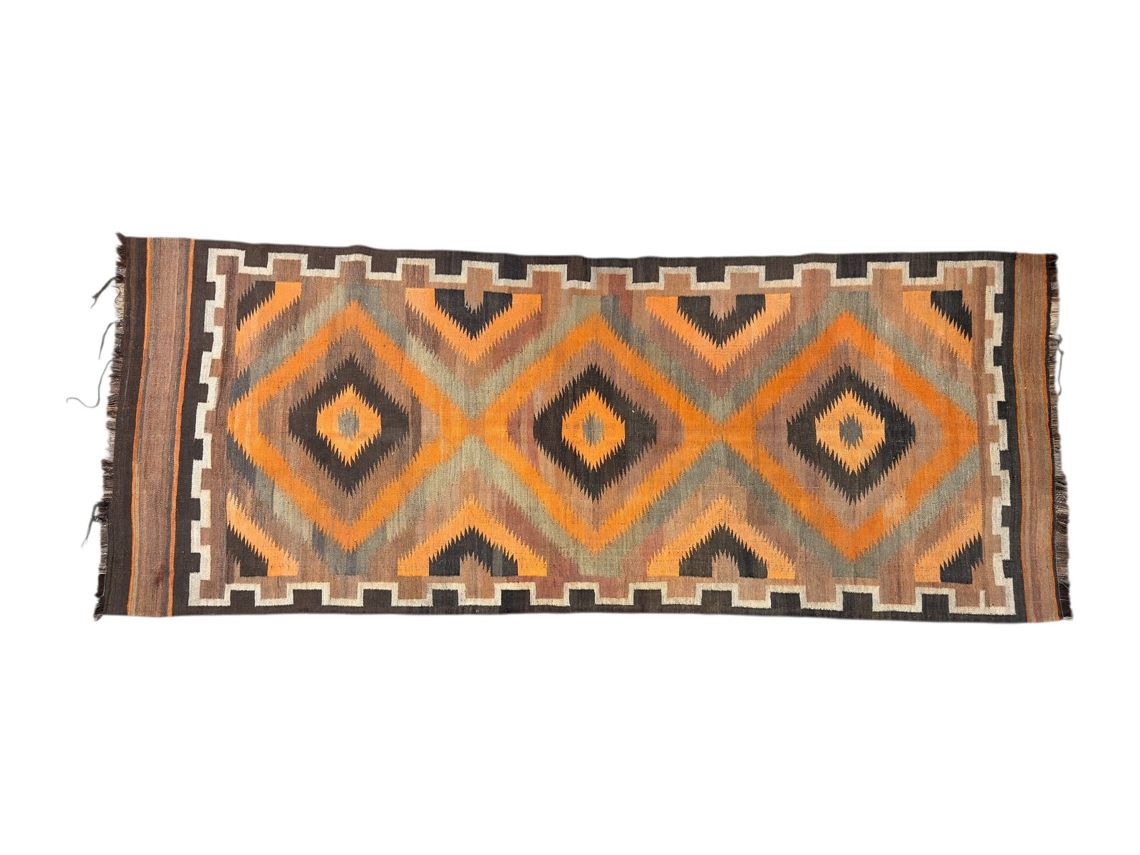 1960s Turkish Handwoven Kilim Rug w/ Geometric Diamond Motif: A vibrant 1960s Turkish handwoven kilim rug featuring a bold tribal geometric design centered around repeating diamond medallions framed by stepped borders, executed in a warm, earthy palette of burnt
