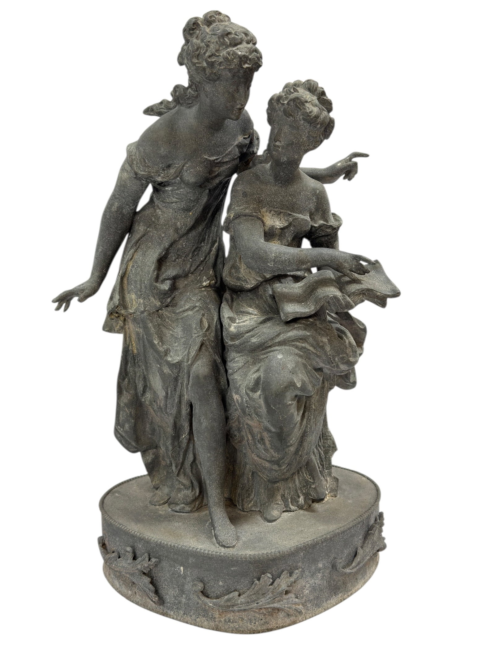 19th C. French Zinc Garden Statue of Two Classical Female Figures: A charming and decorative 19th century French zinc garden statue depicting two classical female figures in a romantic allegorical grouping, one seated and holding an open book while gesturing outward