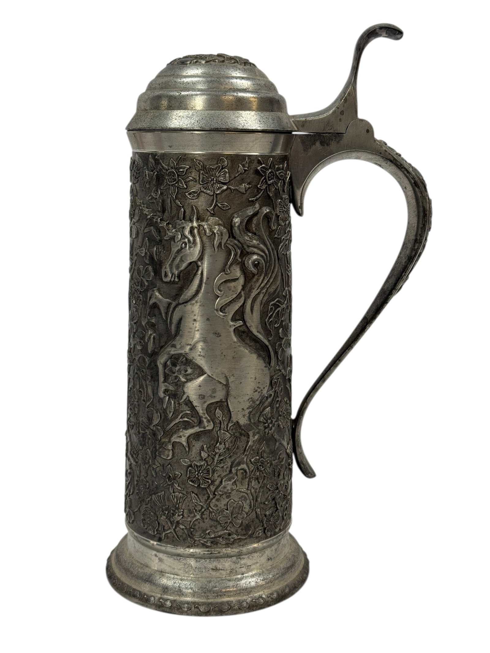 1979 Franklin Mint "The Lion and Unicorn" Fine Pewter Lidded Stein: A 1979 Franklin Mint fine pewter lidded stein, richly decorated in high relief with a heraldic unicorn amid dense floral and foliate ornament, often referred to as “The Lion and Unicorn” tanka