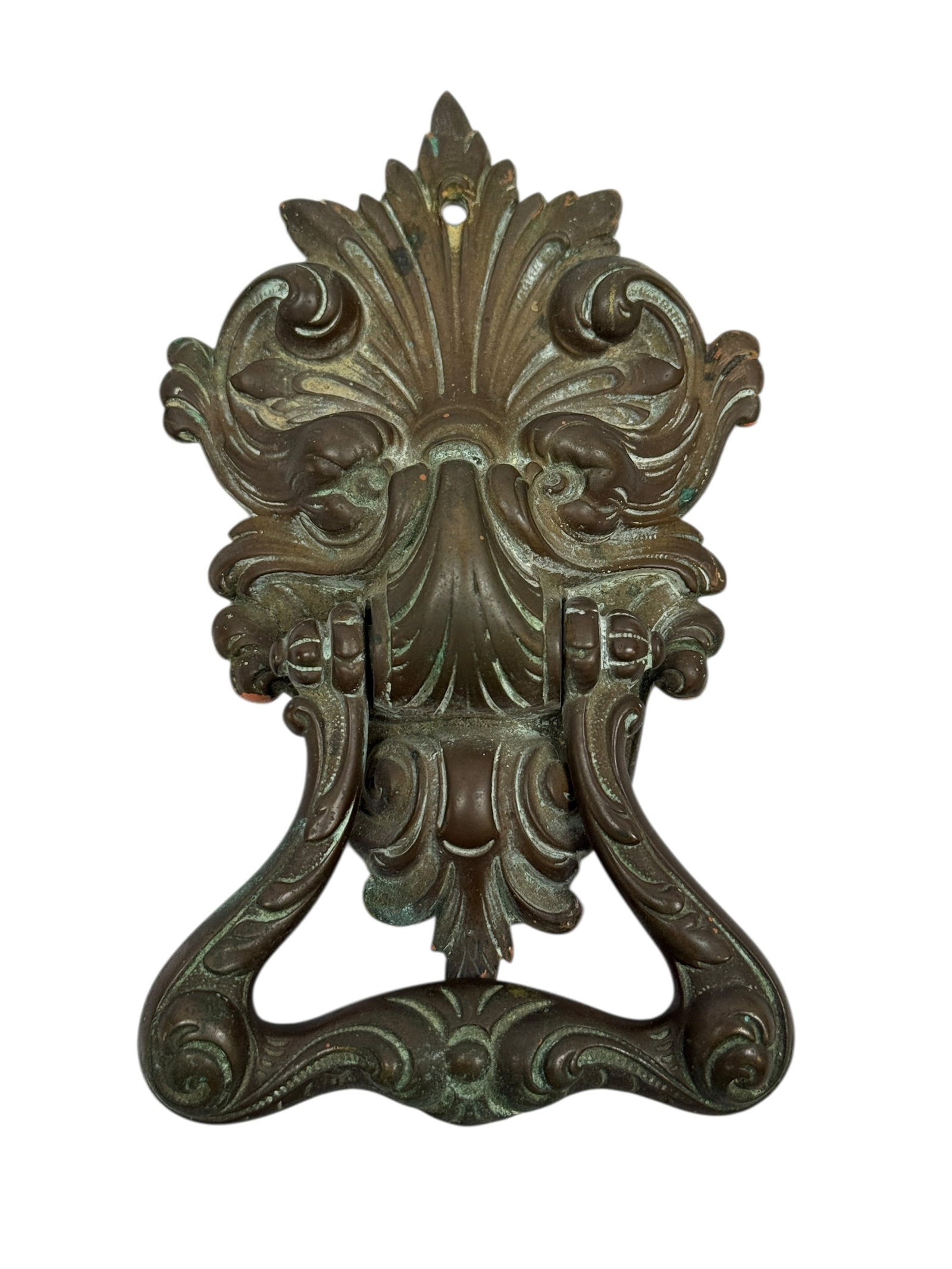 Circa 1880–1910 Rococo Revival Cast Bronze Door Knocker: An attractive late 19th to early 20th century cast bronze door knocker executed in the Rococo Revival taste, featuring an ornate backplate with deeply molded acanthus leaves, scrolling foliate motifs,