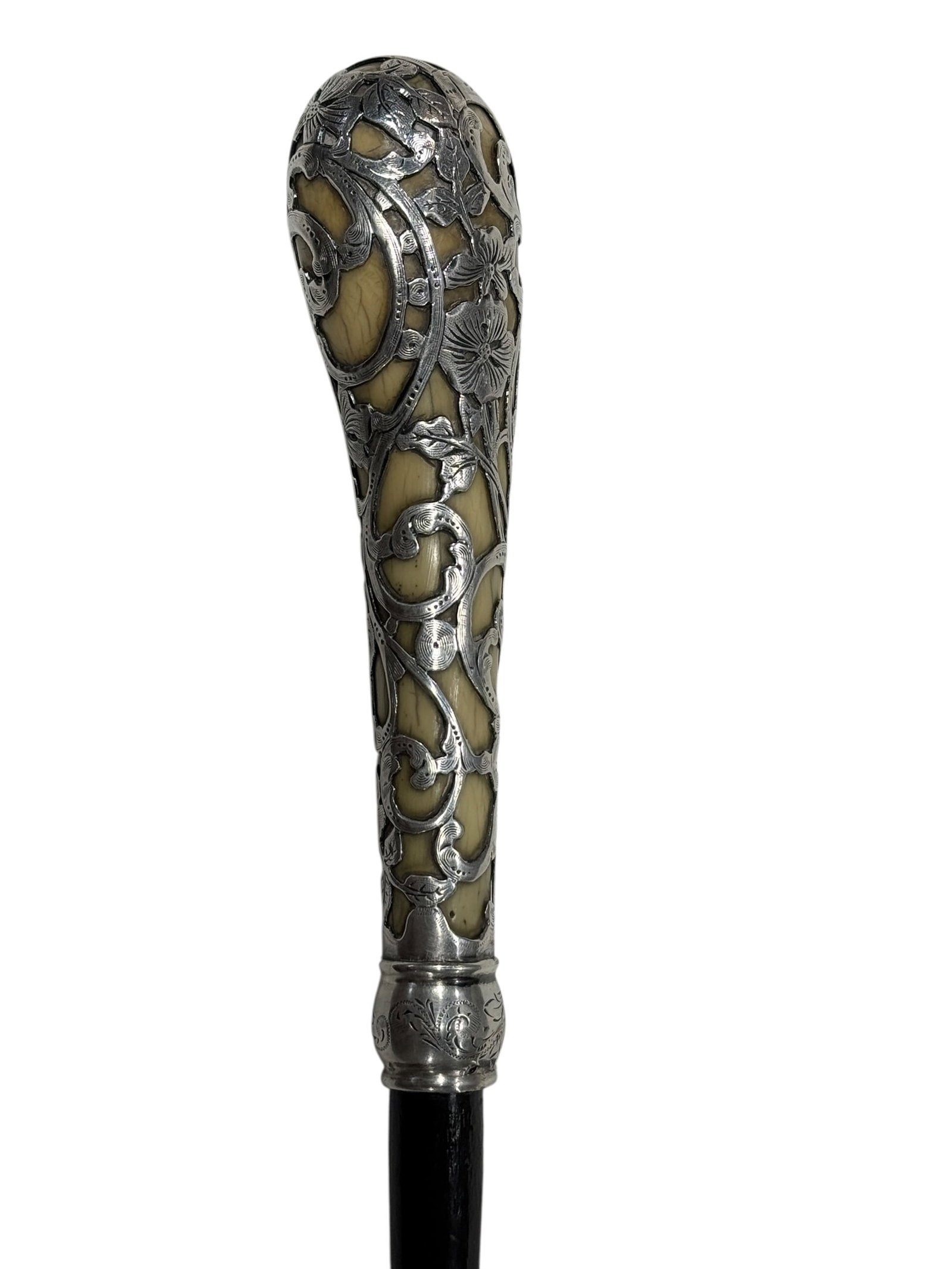 Late 19th C. Bone & Sterling Silver Overlay Handle Cane: Fine late 19th century antique cane featuring an exceptional carved bone handle adorned with intricate sterling silver overlay in a flowing floral and vine motif. The silver work is richly detailed wi