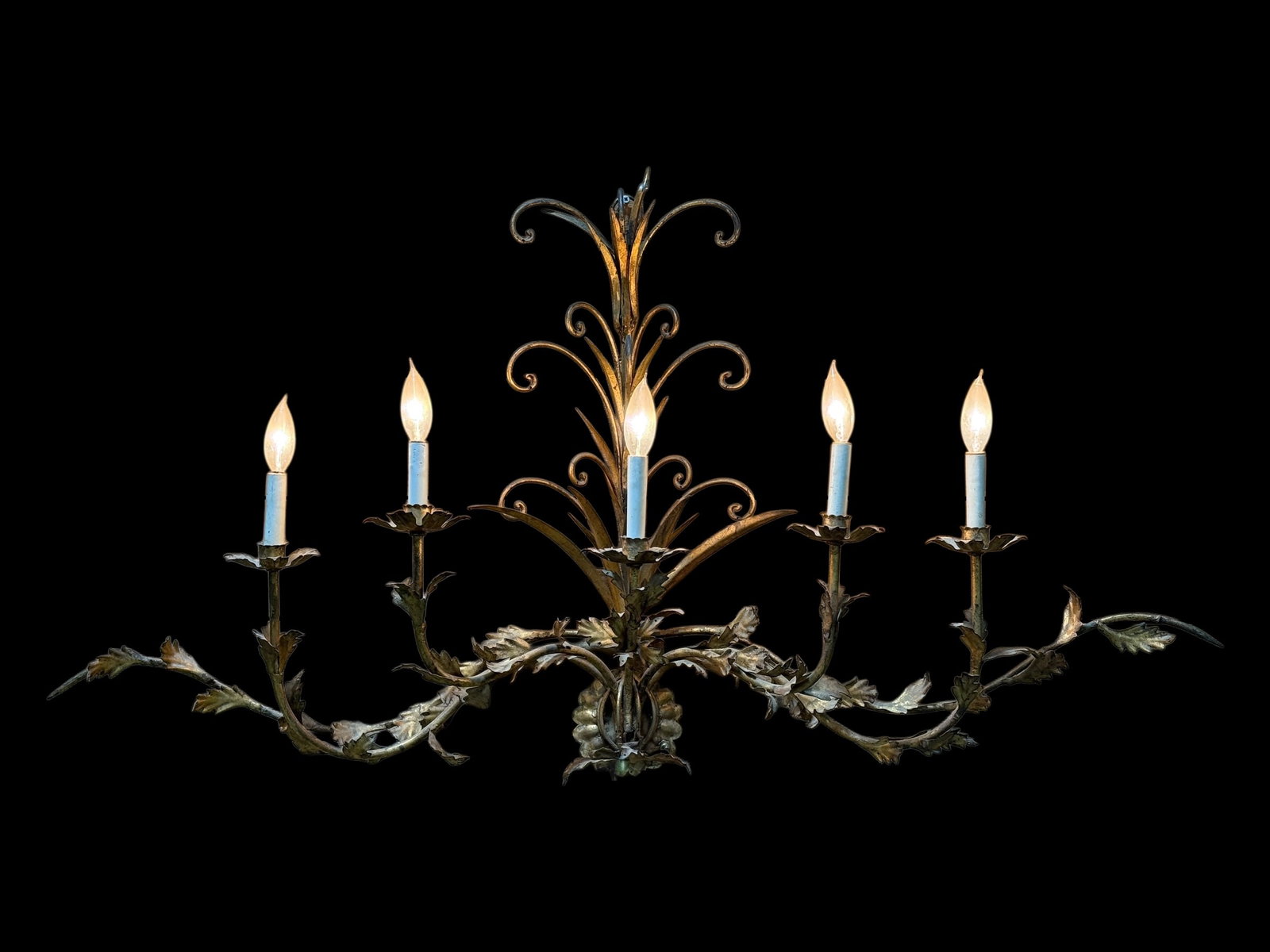 Large Mid Century Italian Regency Style Five-Light Gilt Tole Wall Girandole: A dramatic and substantial Italian Regency / Hollywood Regency style five-light wall girandole, executed in gilt toleware with an exuberant, hand-formed design of scrolling acanthus leaves, curling te