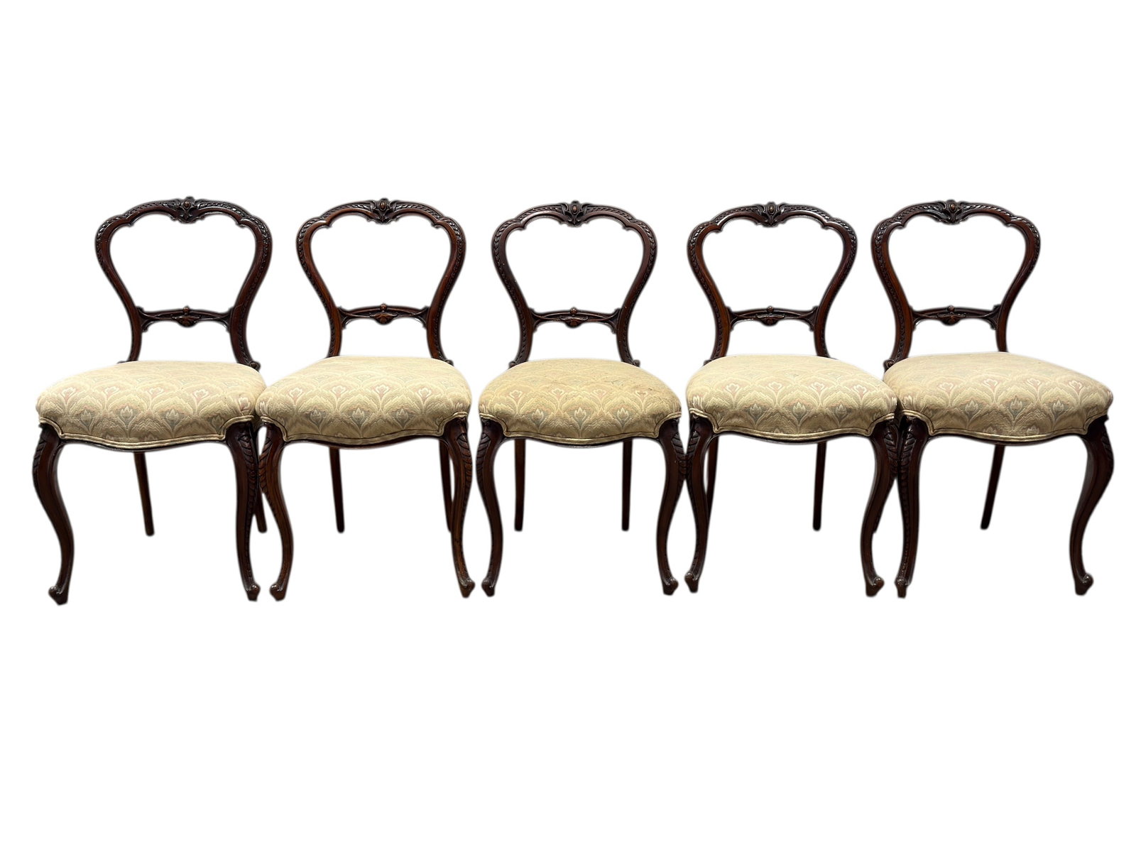 c. 1870 Victorian Renaissance Revival Carved Walnut Chairs (5): An elegant and well-carved set of five Victorian Renaissance Revival side chairs dating to circa 1870, executed in solid walnut with a deep, warm patina and showcasing refined balloon-back forms with