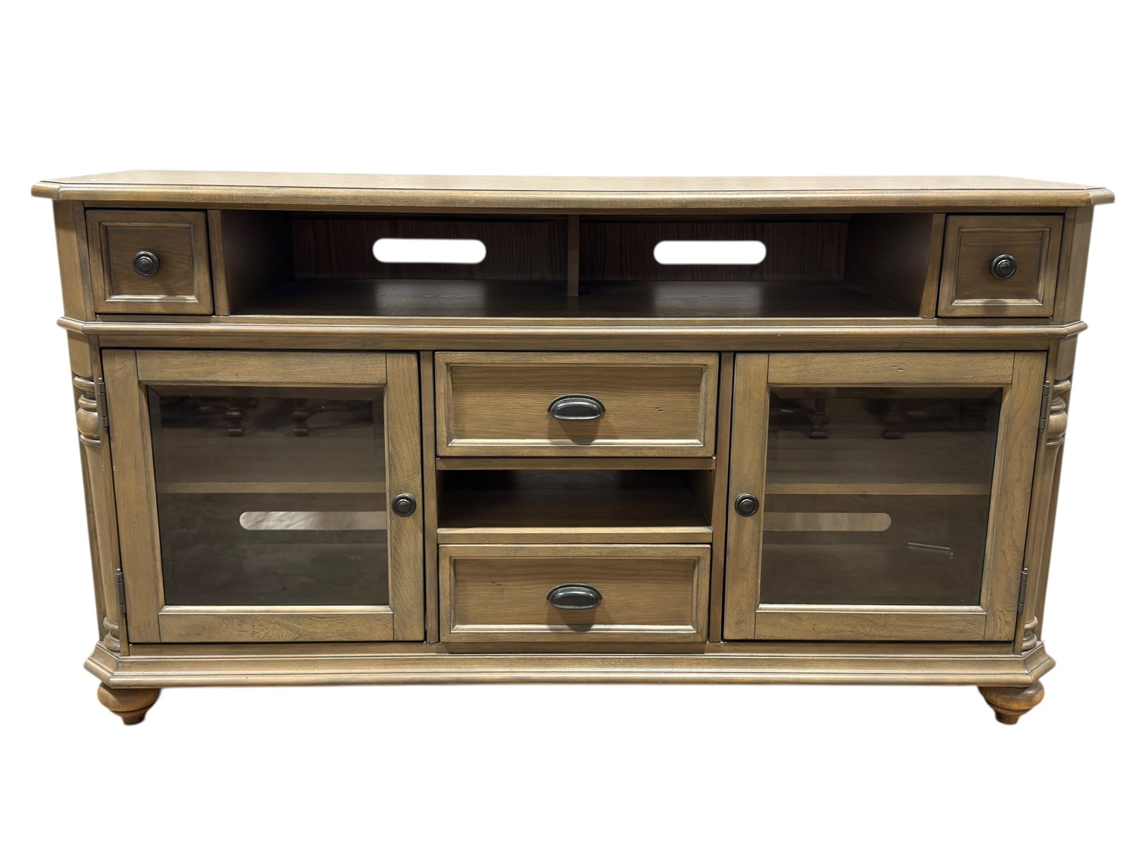 Rustic Style Wood Media Console Cabinet: Rustic style media console cabinet crafted in a warm wood-tone finish, featuring a rectangular form with softly beveled edges, paneled sides, and turned front corner details, designed for both storage