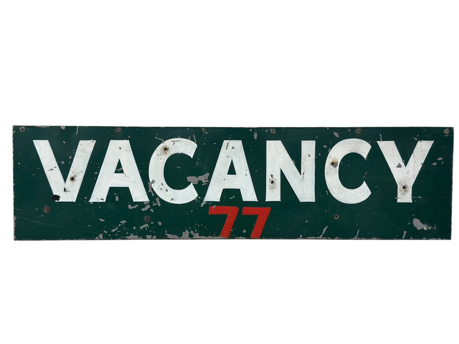 Vintage “VACANCY 77?? Painted Metal Sign: Painted metal sign reading “VACANCY” in large white block lettering against a dark green field with a red “77” designation below, likely from a roadside motel, motor lodge, or apartmen