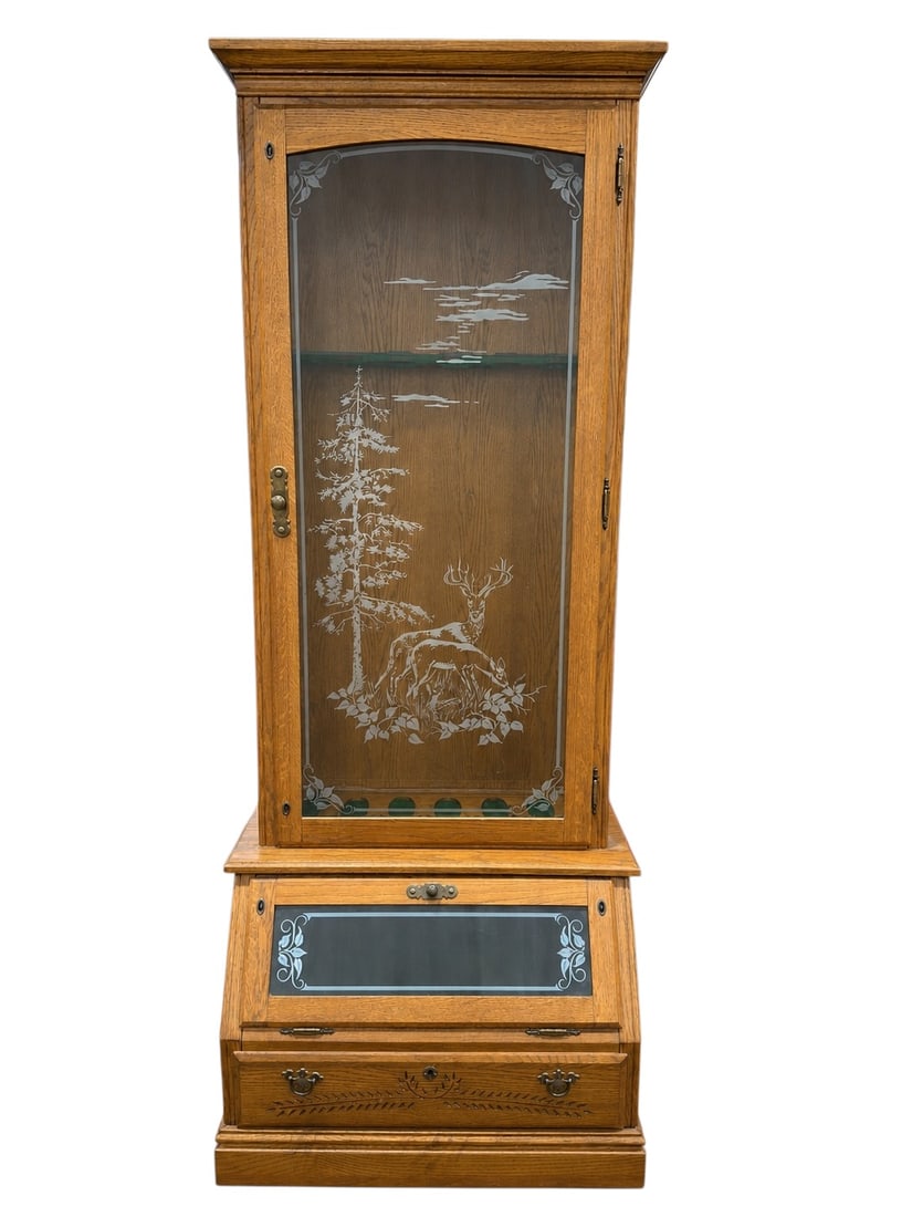 Fort Harrison Products Corp. Gun Cabinet w/ Etched Hunting Scene Glass: Mid-20th century Fort Harrison Products Corp. wooden gun cabinet featuring a single glazed door decorated with an attractive etched hunting scene depicting a deer beneath a tall pine tree with stylize