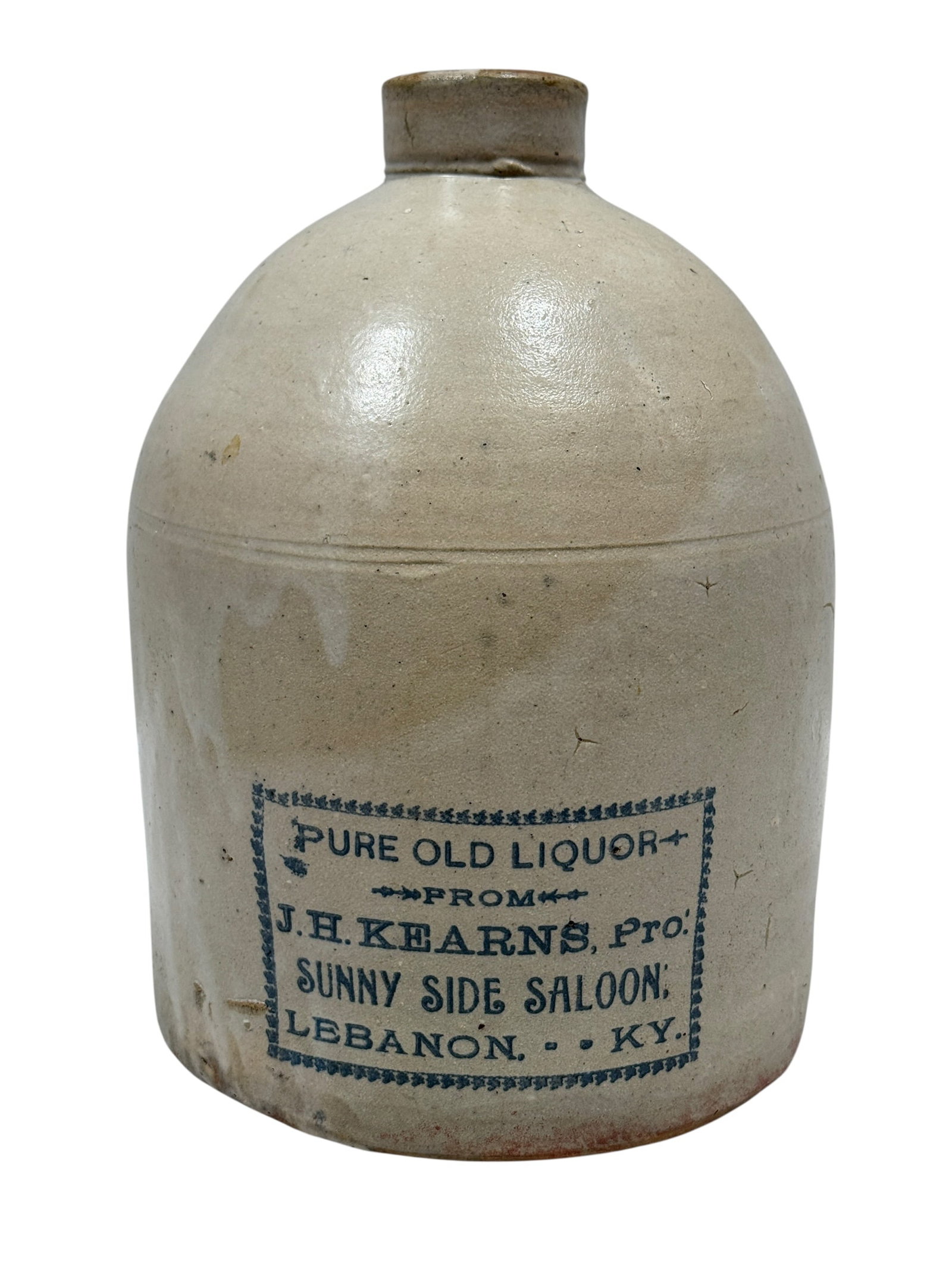 J.H. Kearns “Sunny Side Saloon?? Lebanon, Kentucky Stoneware Advertising Jug: A classic American salt-glazed stoneware advertising jug of ovoid form with applied strap handle and short collar, featuring a bold cobalt stencil reading:“PURE OLD LIQUOR / FROM / J.H. KEARNS, Pro.
