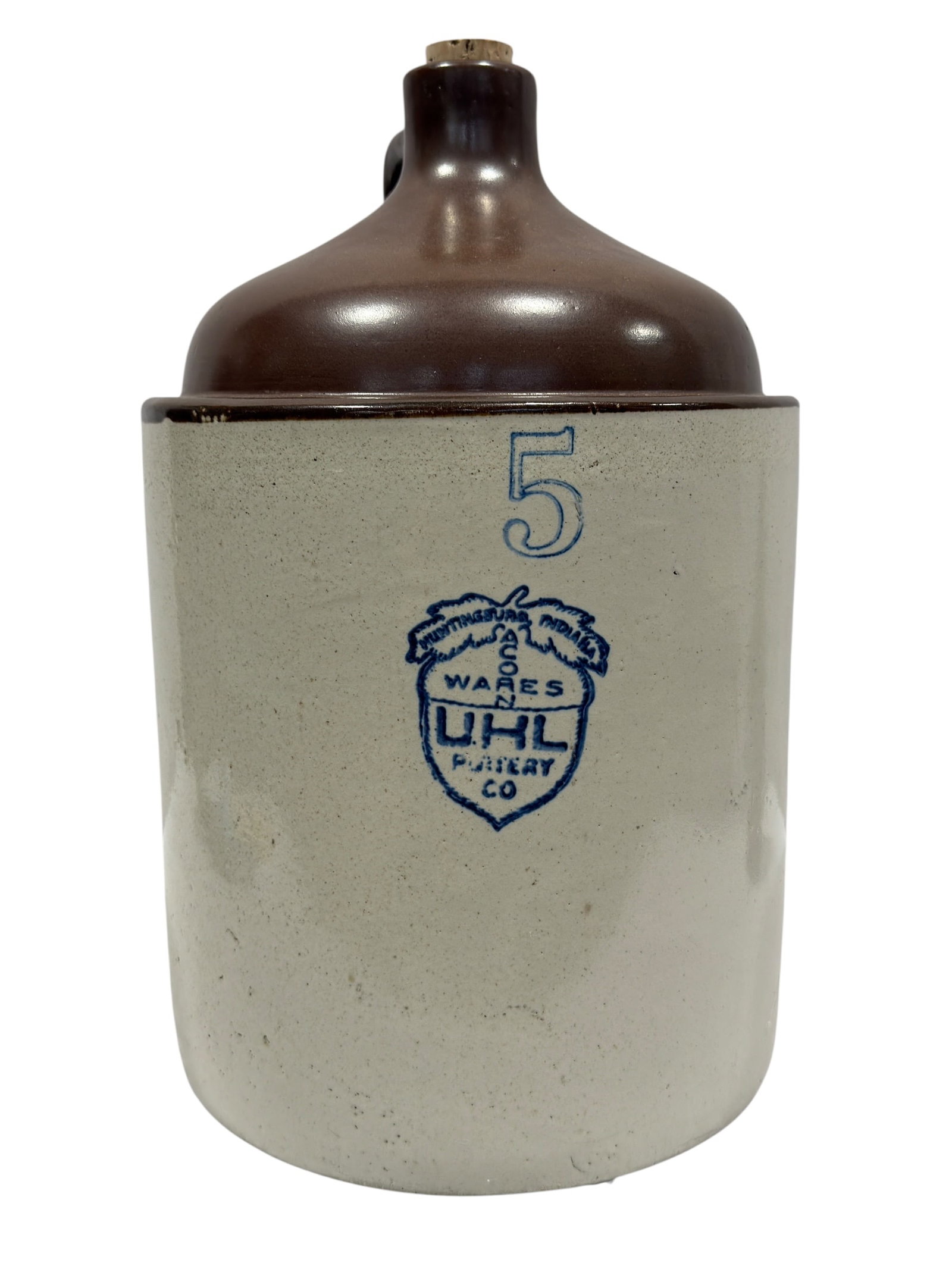 Antique 5 Gallon UHL Pottery Company Stoneware Whiskey Jug: Large antique 5 gallon stoneware whiskey jug manufactured by the UHL Pottery Company of Huntingburg, Indiana, featuring a classic natural salt-glazed body with dark brown shoulder glaze and applied ha