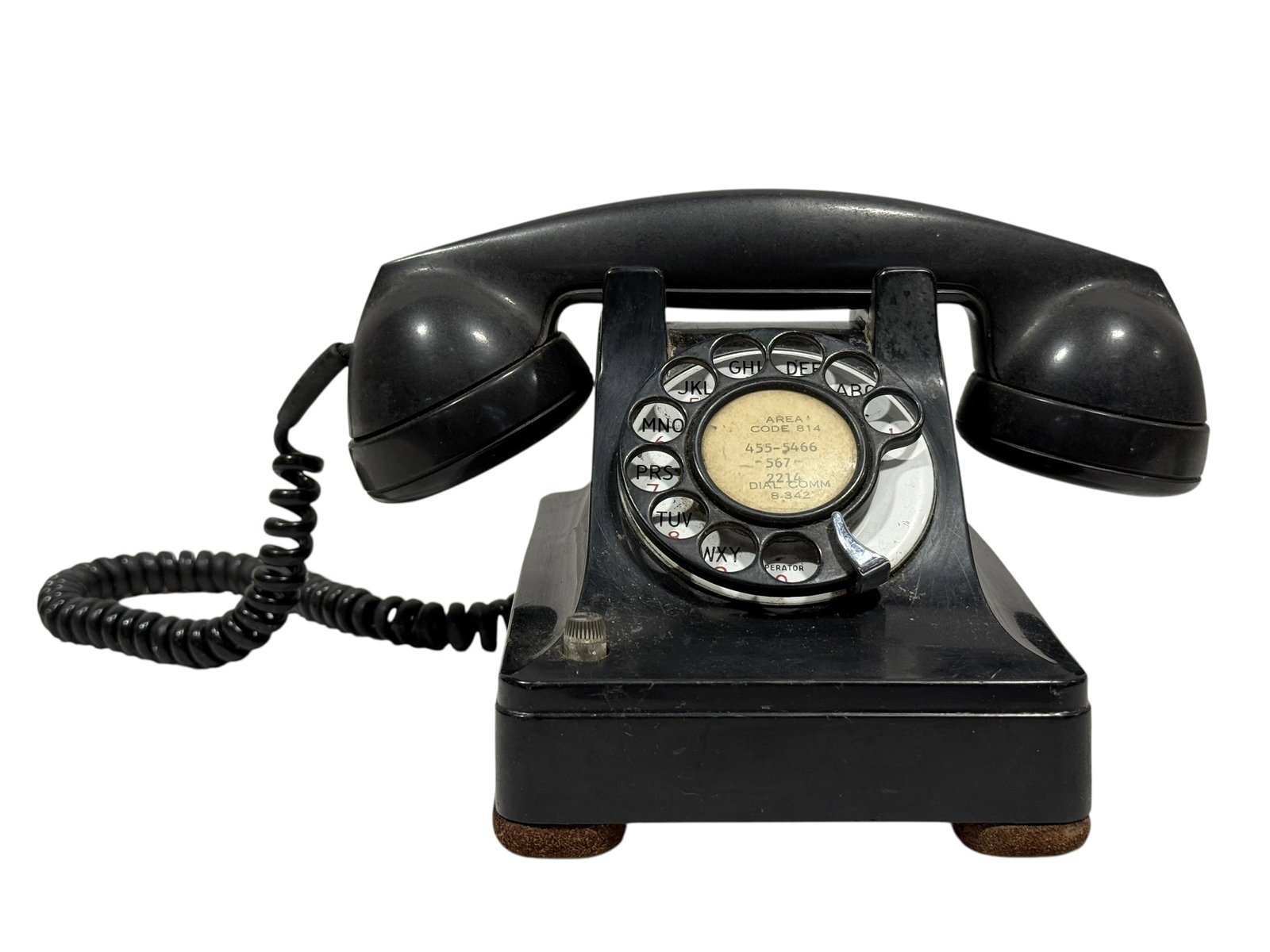 Western Electric Bakelite Model 500 Rotary Telephone: Classic mid-century Western Electric rotary desk telephone in black, identified by the molded “Western Electric Company” marking on the handset. This Model 500-style desk phone features the tr