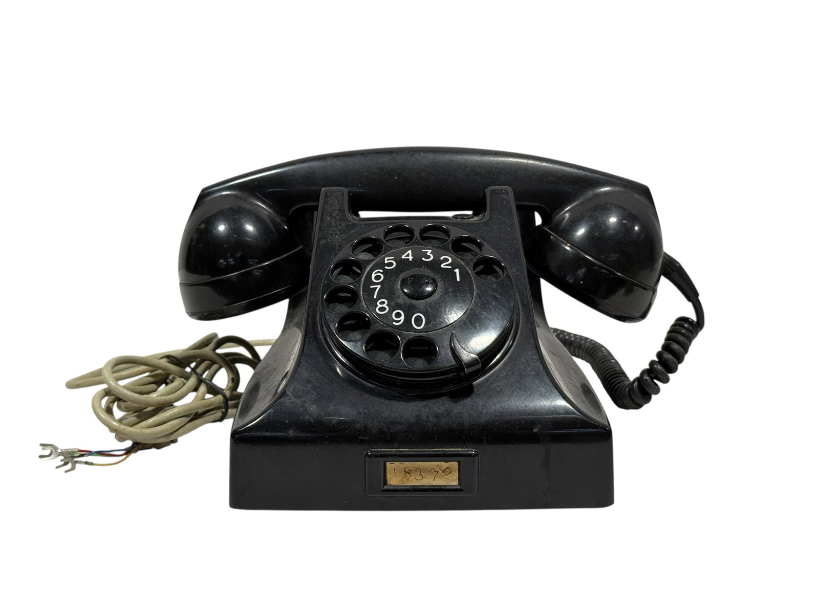 Ericsson / PTT Black Rotary Desk Telephone: Vintage black rotary desk telephone manufactured by Ericsson for the Dutch PTT (state postal and telephone service of the Netherlands). This mid-century European desk phone features a sleek Bakelite-s