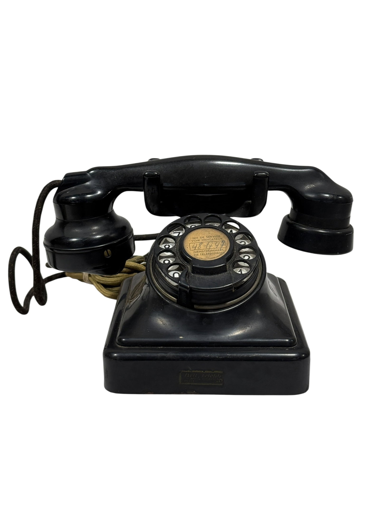 Automatic Electric / Belgian Rotary Desk Telephone: Vintage black rotary desk telephone manufactured in the style of Automatic Electric and European post office telephones of the 1930s–1950s, featuring a heavy black bakelite or hard composition body 