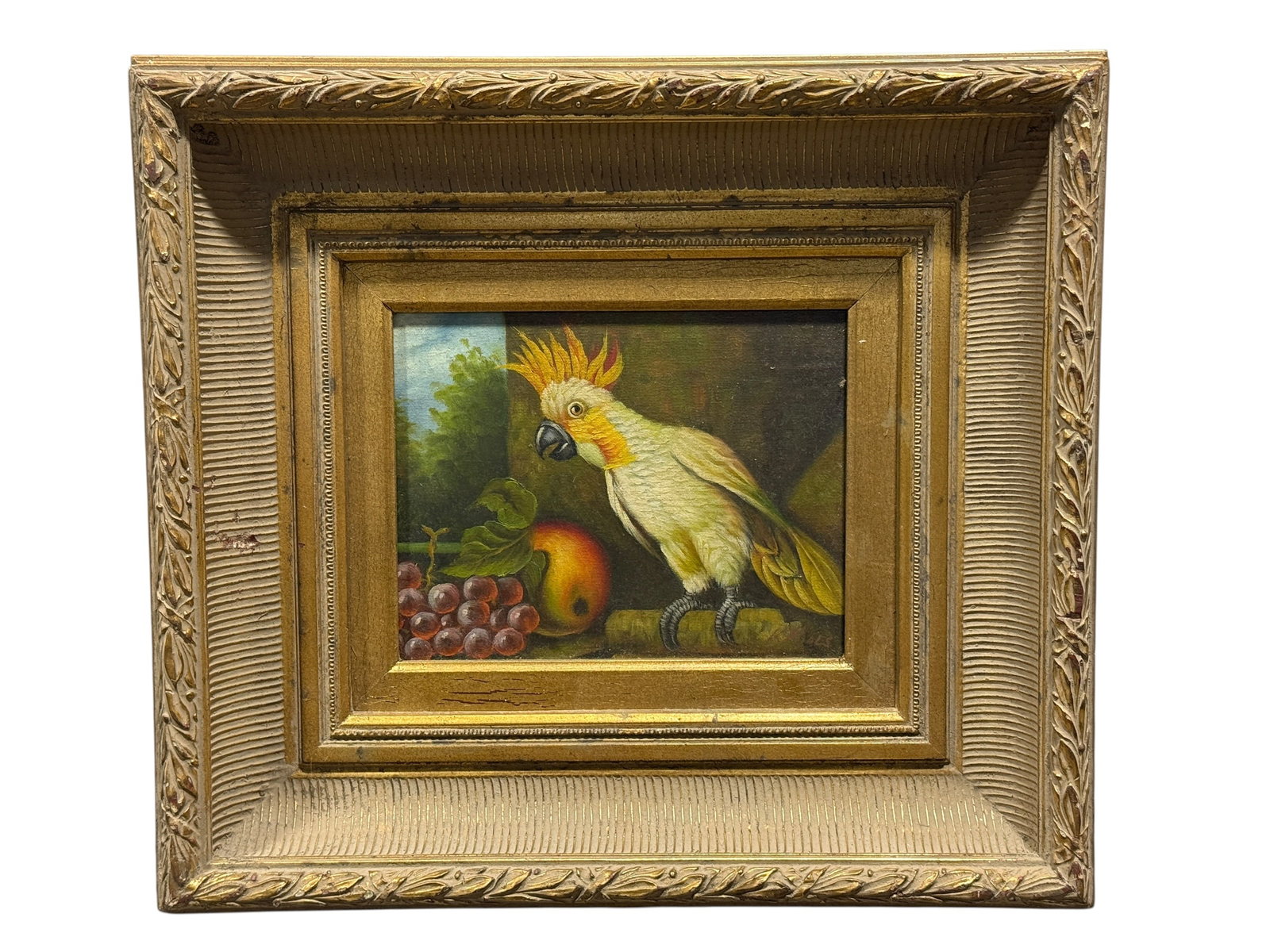 K. Mills Oil on Canvas Cockatoo Still Life Painting: Charming original oil on canvas painting depicting a white cockatoo with vivid yellow and orange crest perched beside a cluster of grapes and a ripe peach. Executed in a traditional still-life style, 