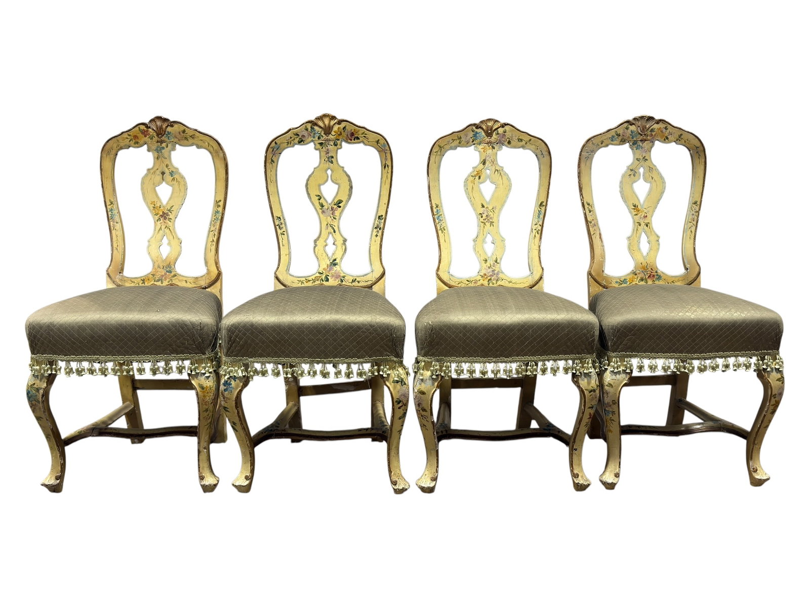 (4) 18th Century Dutch Painted & Parcel-Gilt Side Chairs: A charming and rare set of four 18th-century Dutch Rococo period side chairs. Each chair features a beautifully shaped crest rail centered by a carved shell motif, over an elegant, pierced vase-shaped