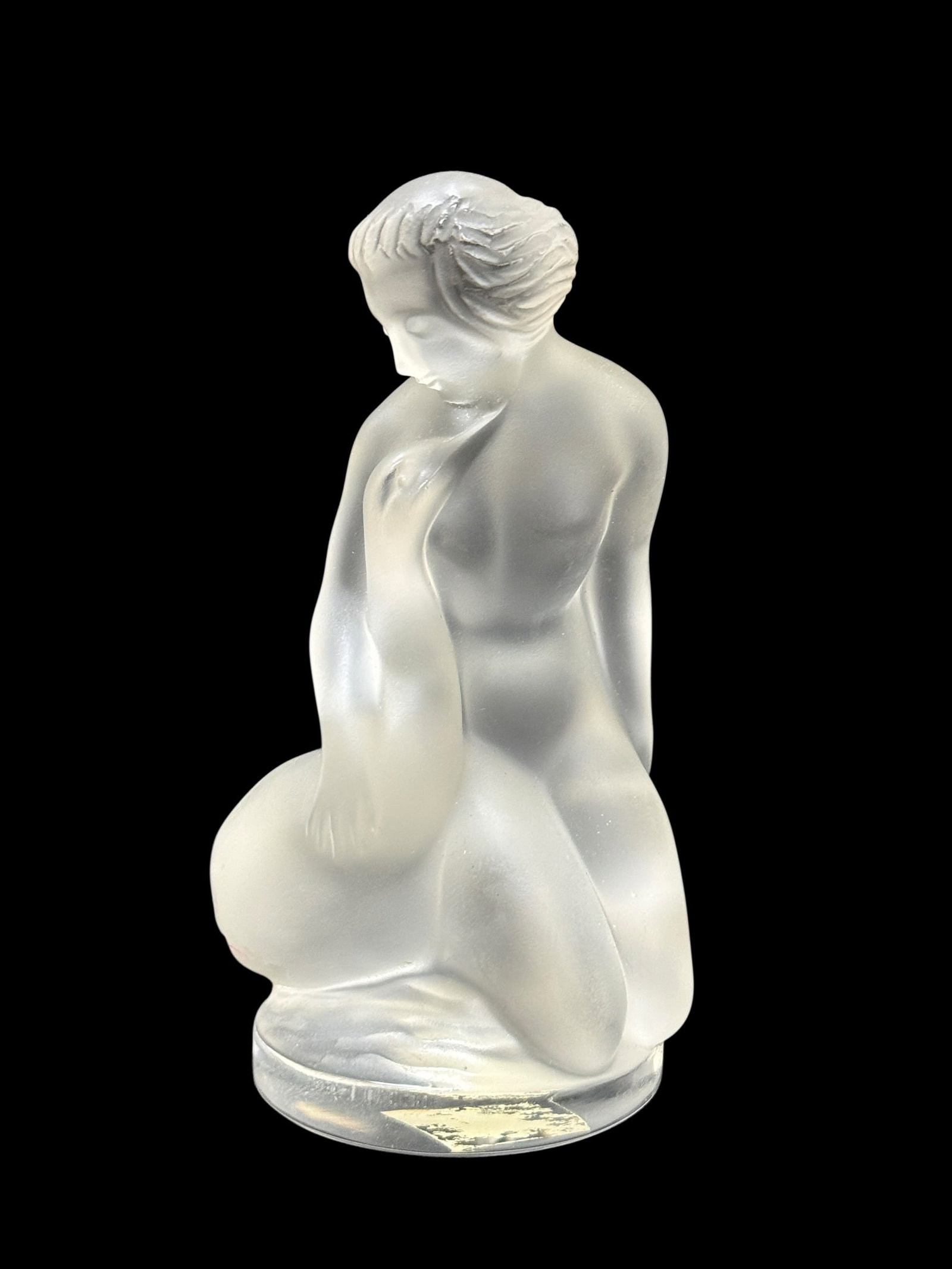 Signed Lalique Frosted Crystal "Leda and the Swan" Figure: An iconic and beautifully rendered French frosted crystal mythological figurine titled "Leda and the Swan" by Lalique. The sculpture depicts a kneeling female nude in a tender, fluid embrace with Zeus