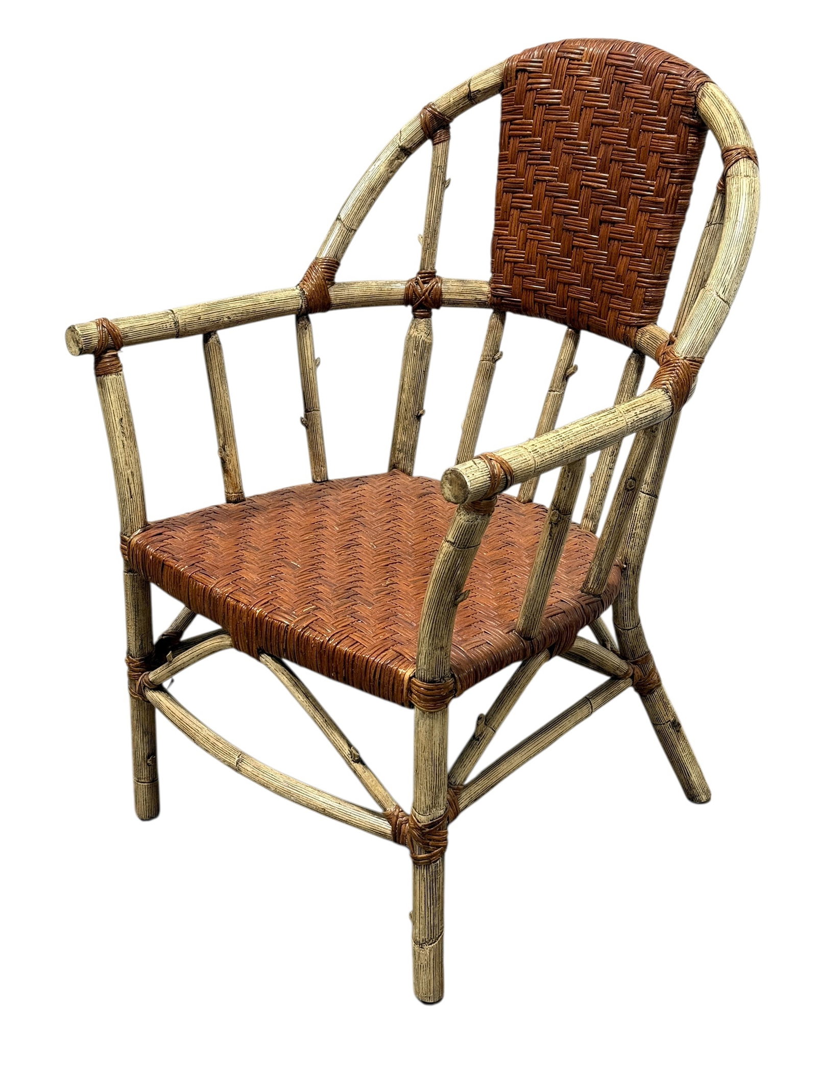 Palecek Faux Bamboo & Woven Rattan Armchair: An organic modern armchair by luxury designer Palecek, combining rustic textures with refined craftsmanship. The sturdy frame is meticulously crafted to mimic natural bamboo or birch branches, complet