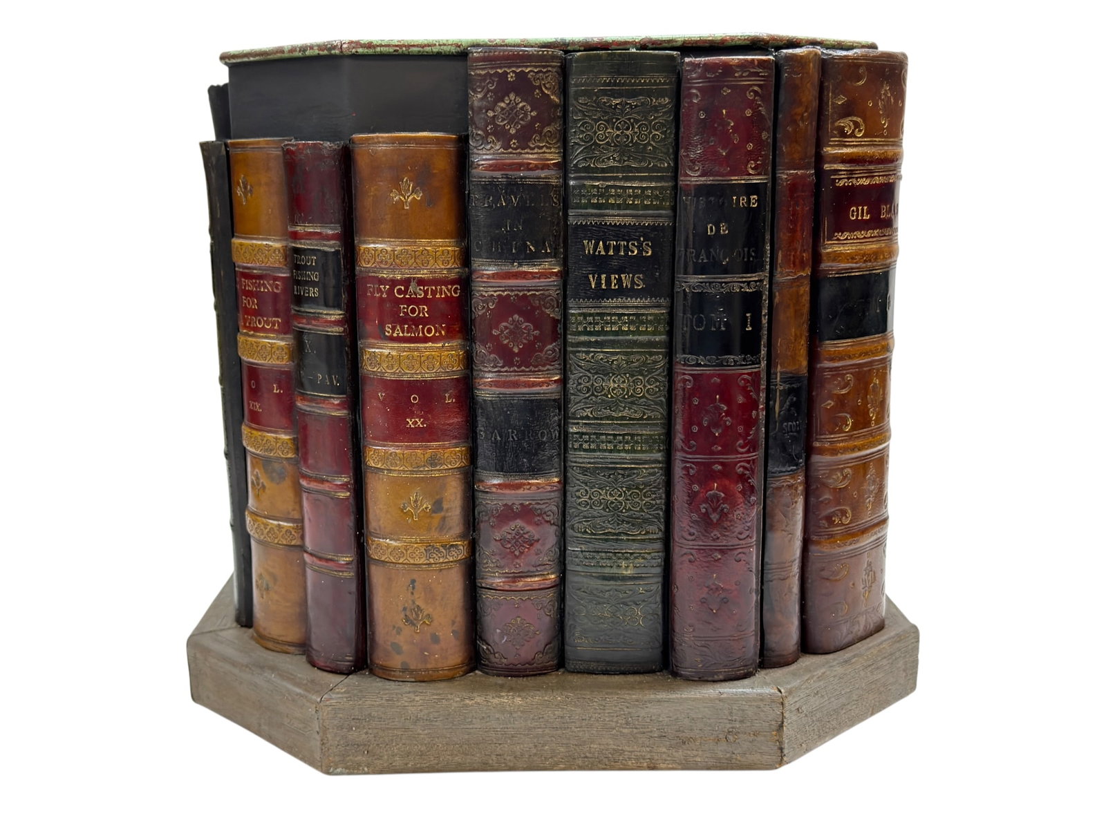 English Early 20th-Century Style Faux Leather Book-Spine Wastebasket: An elegant mid-to-late 20th-century library-style octagonal wastepaper basket (or decorative planter holder), crafted in the English early 20th-century style. The exterior is formed by an octagonal ar