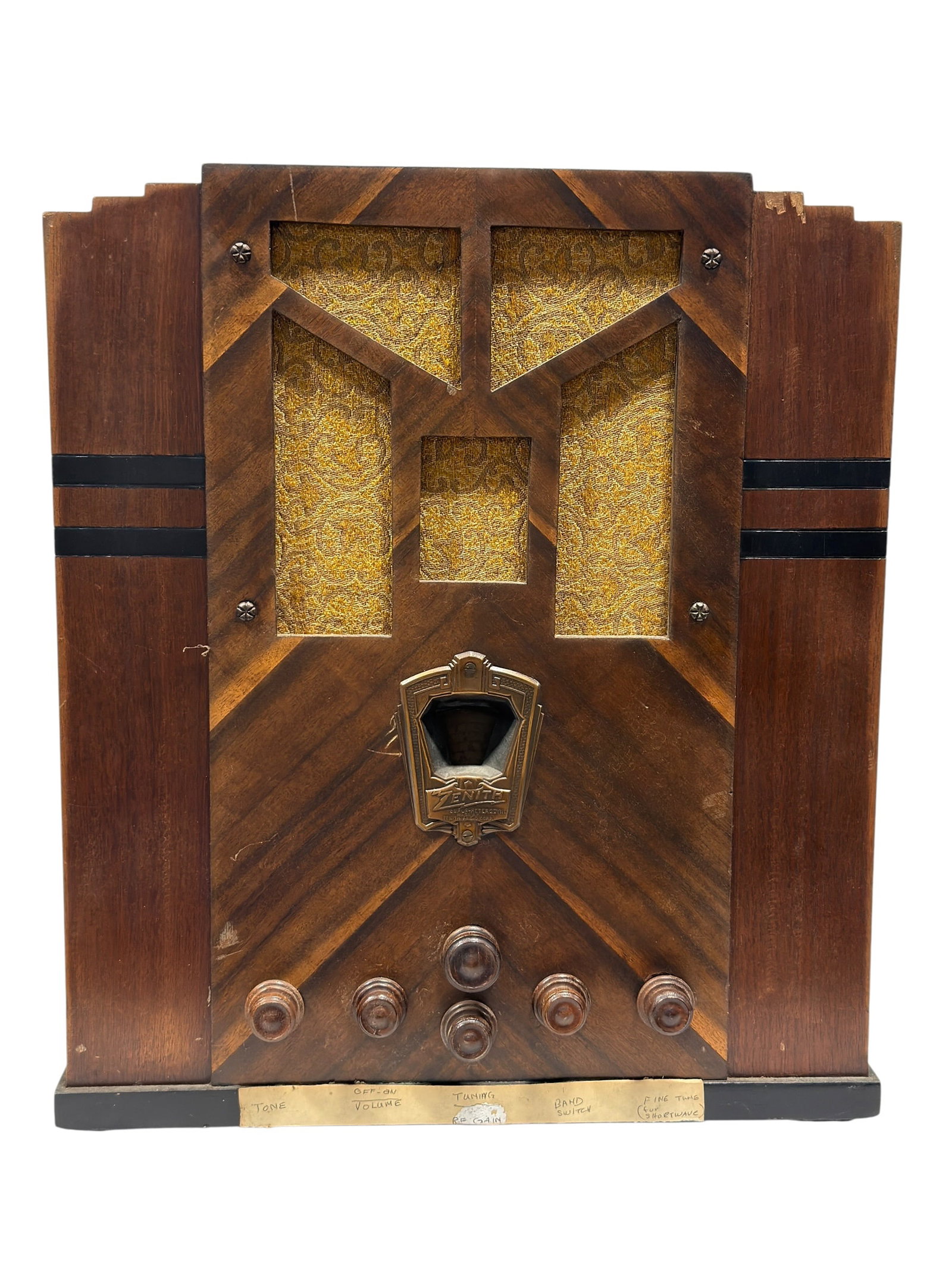 1930s Zenith Model 288 Art Deco Tombstone Radio: This classic 1930s Zenith Model 288 tombstone-style tabletop radio features a striking Art Deco walnut veneer cabinet. The architectural front panel is designed with geometric cutouts over the origina