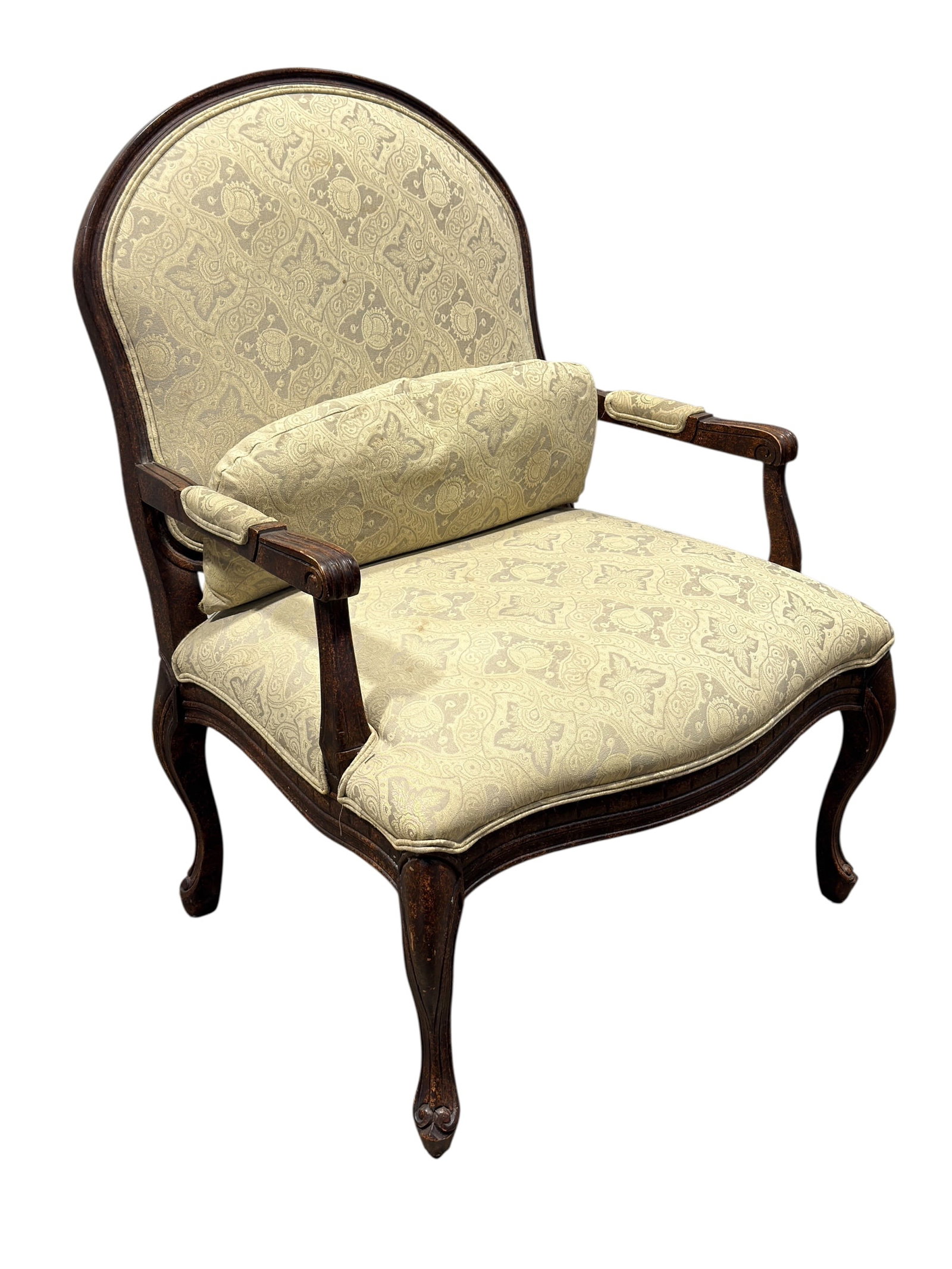 Vintage French Provincial Style Bergère Armchair: A vintage French Provincial style bergère armchair featuring a molded oval backrest with exposed wooden framing and a central rear interlocking open splat design. The stained and distressed wooden fr
