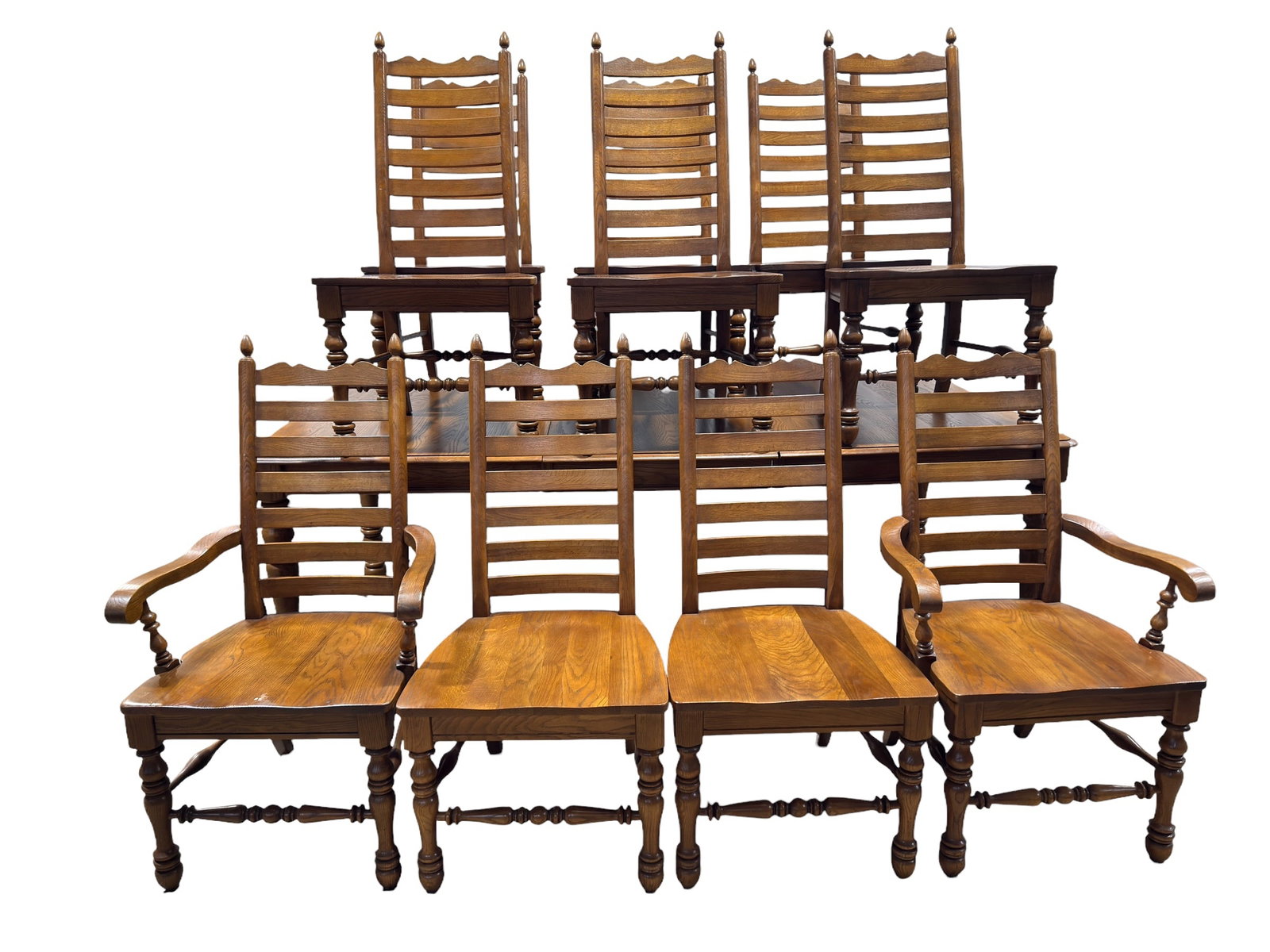 Vintage Keller Solid Wood Dining Table and 8 Chairs: A vintage solid wood dining suite produced by Keller Furniture, comprising an extension dining table and a matching set of eight ladder-back dining chairs. The rectangular table features a smooth, fin