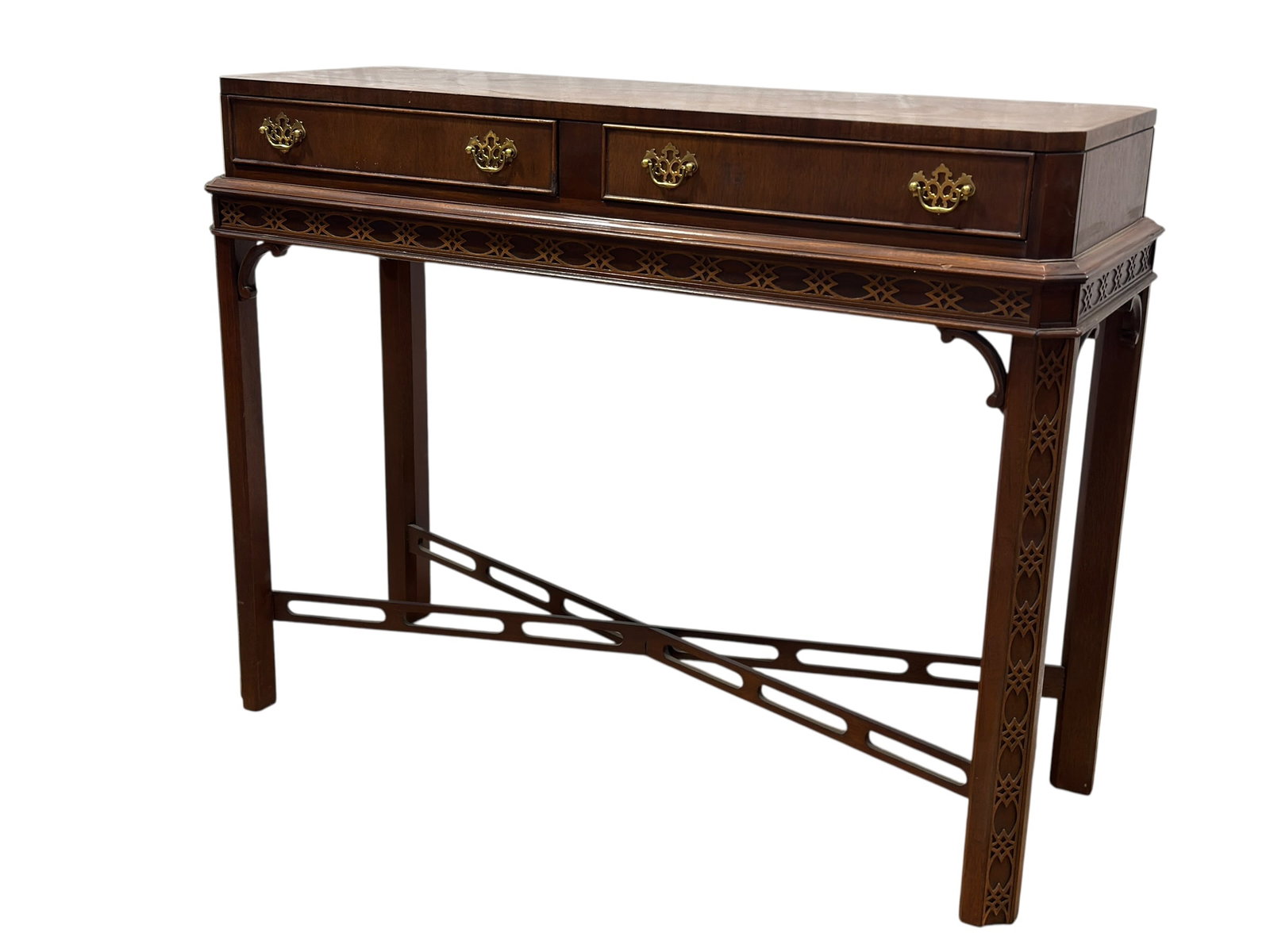 20th C. Mahogany 2 Drawer Foyer Table in the Style of Hickory Chair: An elegant mahogany foyer or console table in the style of Hickory Chair, distinguished by its refined proportions, richly figured veneered top, and architectural open base. The upper case is fitted w