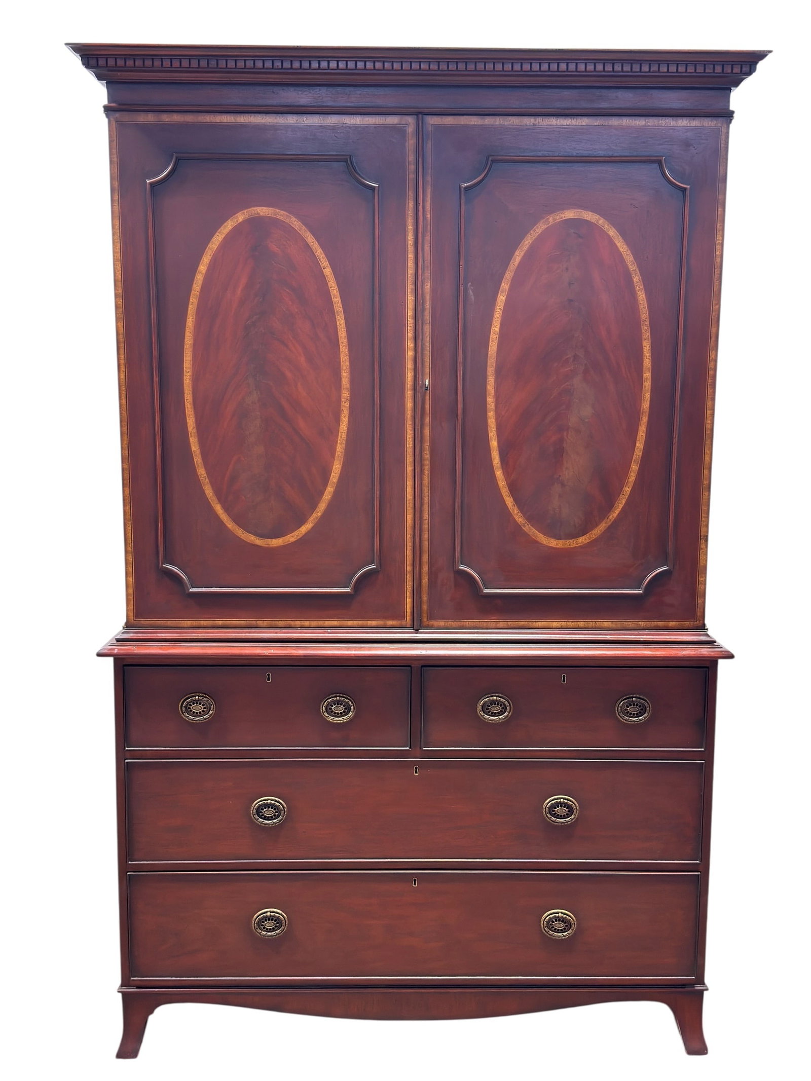 20th C. English George III Style Inlaid Mahogany Linen Press: A handsome 20th c. English George III style linen press of substantial two-part form, crafted in richly toned mahogany and highlighted by contrasting satinwood or boxwood inlay. The upper cabinet is s