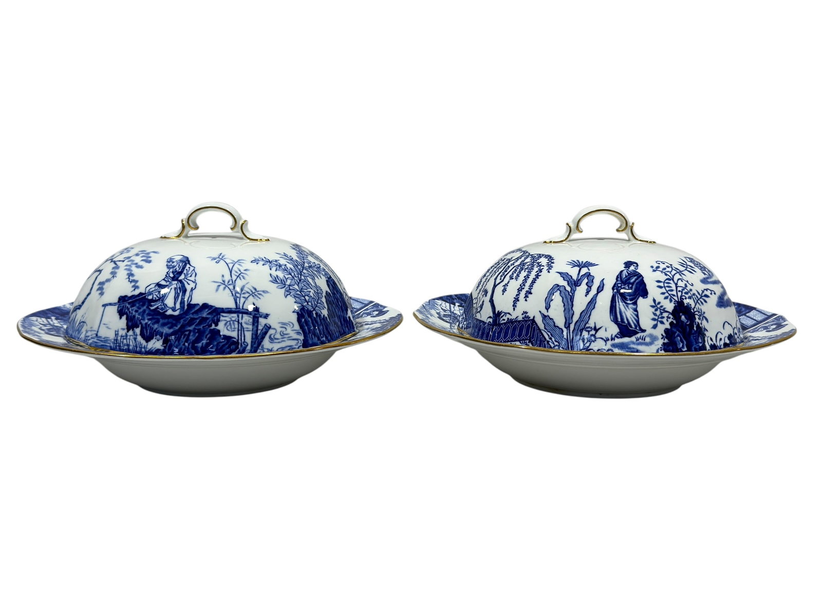 Pair of Royal Crown Derby Blue Mikado Covered Serving Dishes: A handsome pair of Royal Crown Derby porcelain covered serving dishes in the celebrated Blue Mikado pattern, each decorated in rich cobalt blue with finely rendered Chinoiserie landscapes featuring se