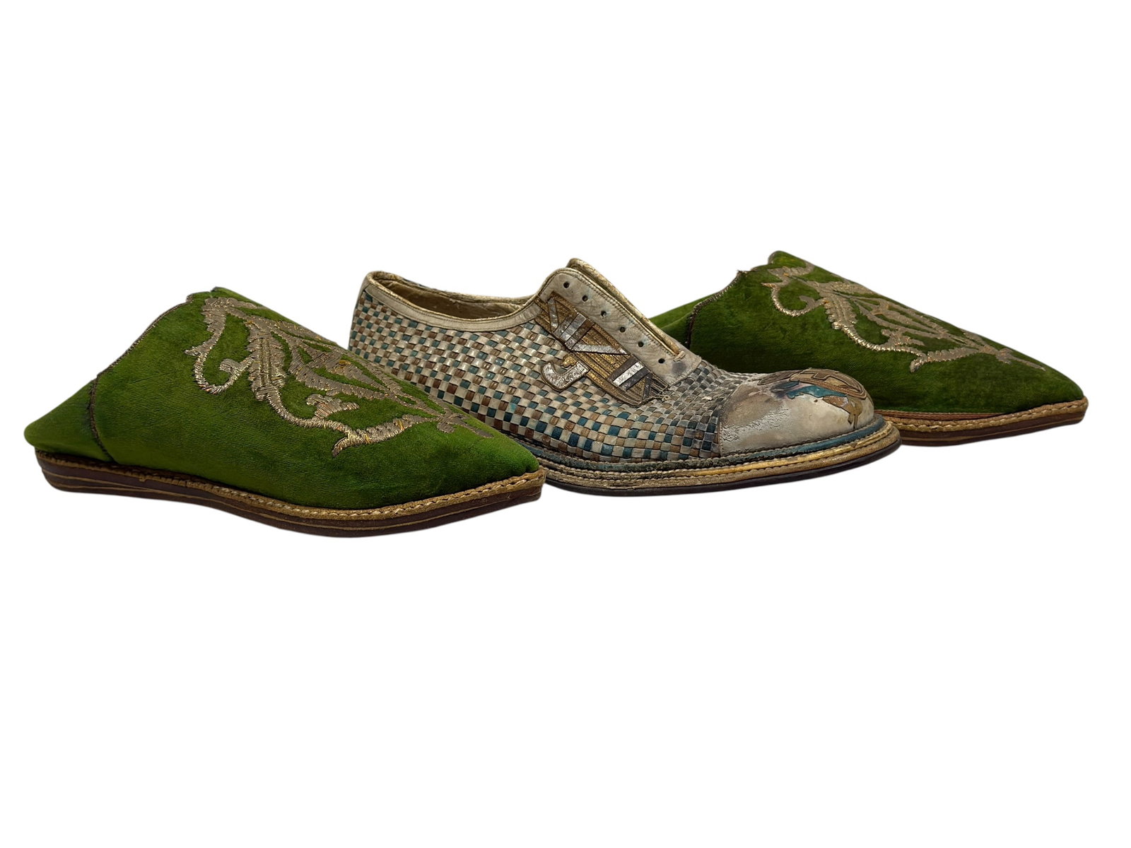 Pair of Antique Embroidered Green Velvet Slippers & Hand Woven Leather Shoe: Decorativ e antique footwear grouping comprising a pair of vivid green velvet slip-on slippers with cream-colored scrolling foliate embroidery across the pointed toes, metallic-thread edging, tan leat